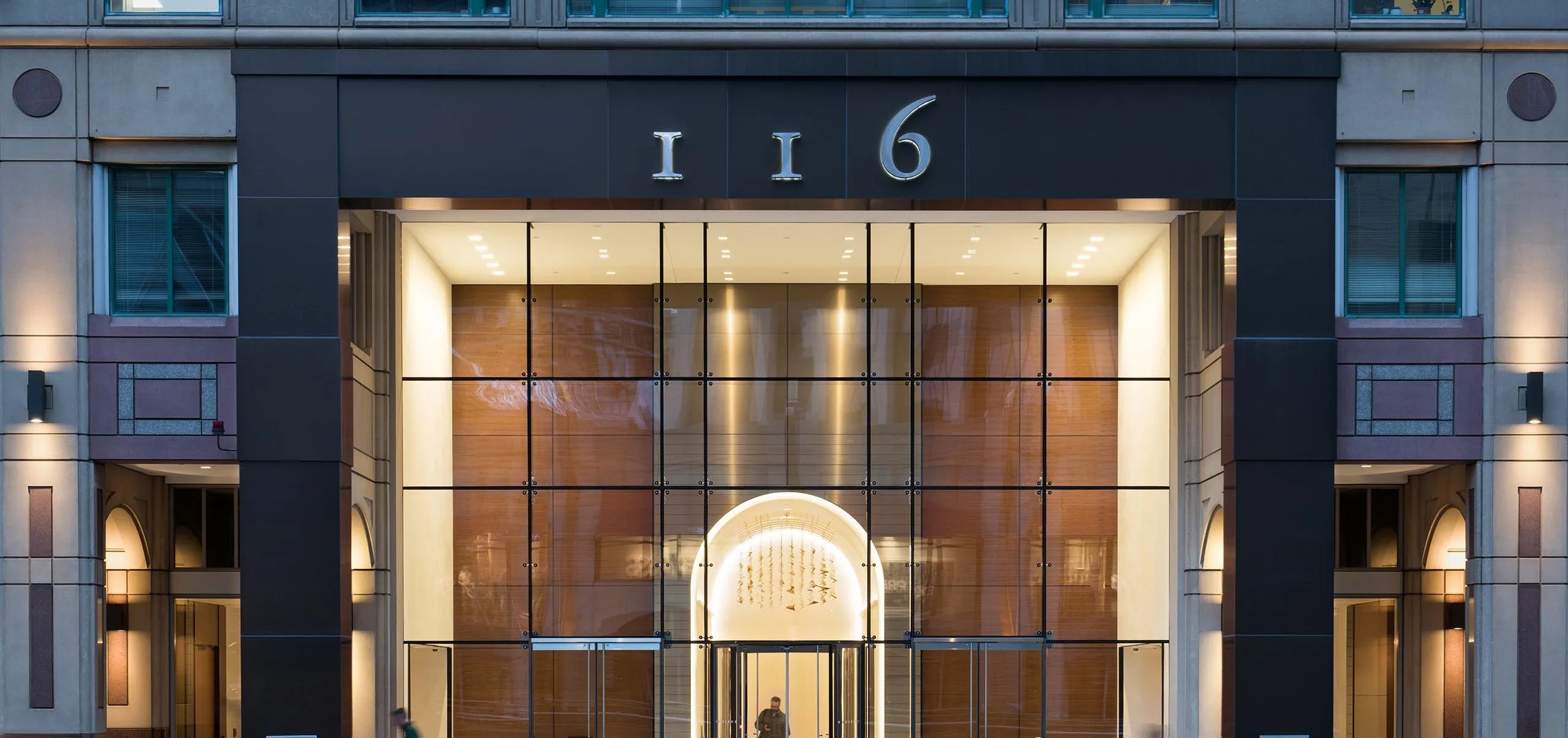 Exterior of glass multistory entryway to 116 Huntington Avenue