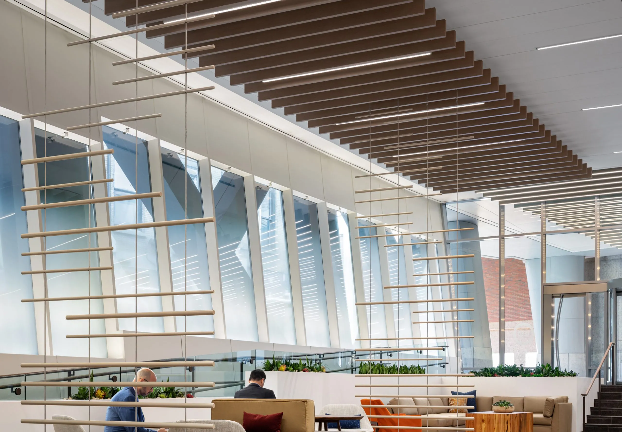 Couches and chairs in seating area in office building