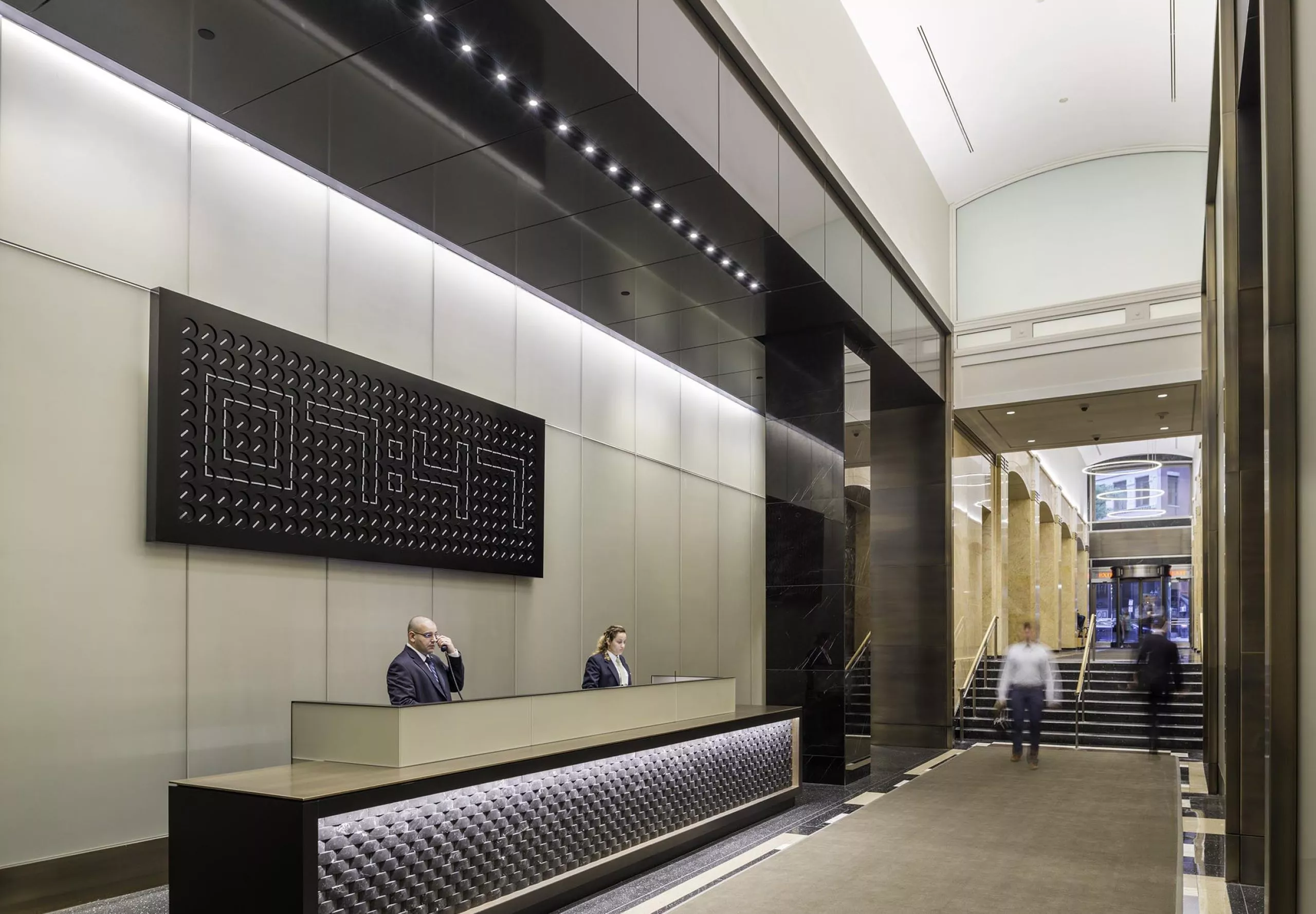 Front desk and entryway of apartment building 75-101 Federal street