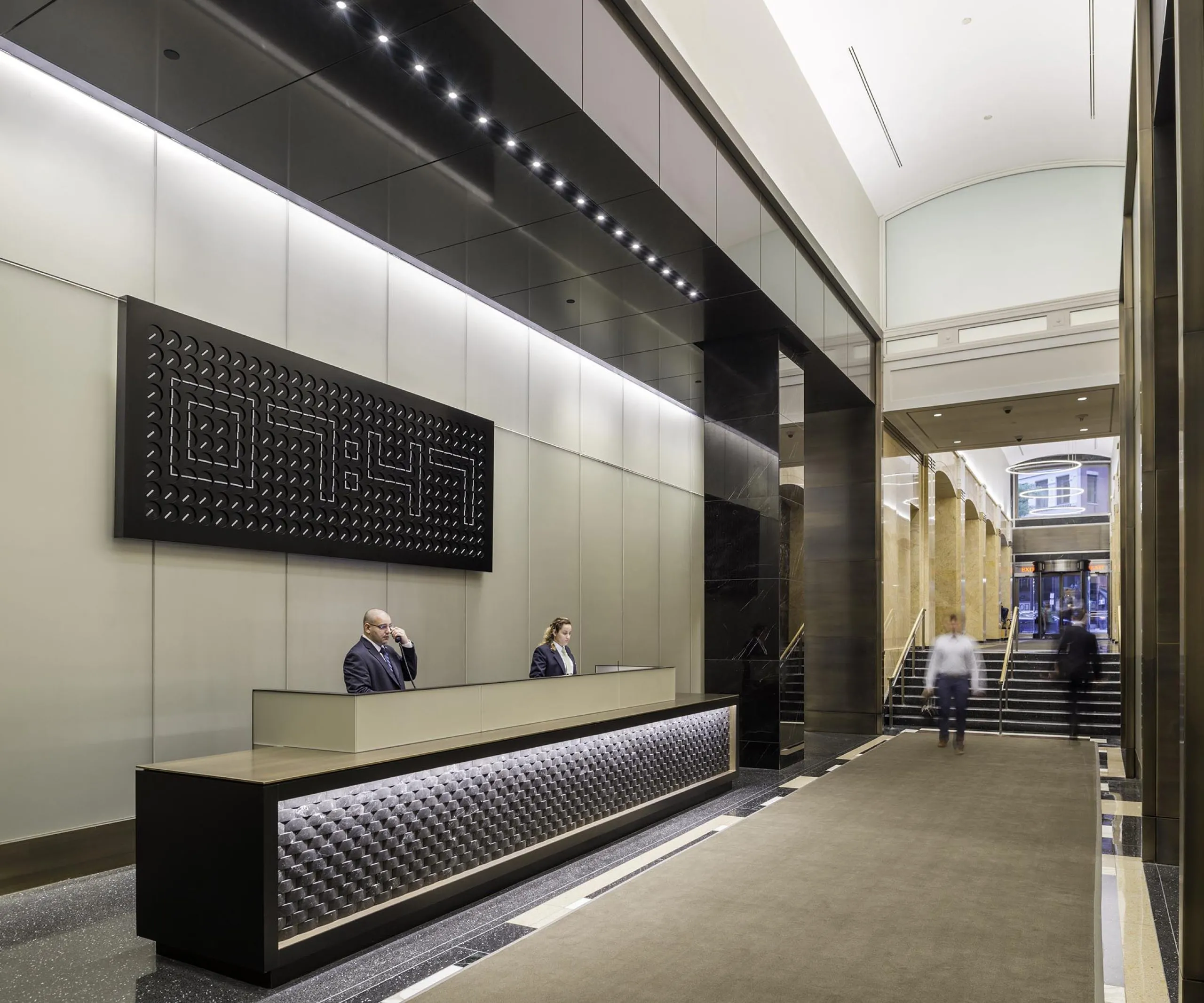 Front desk and entryway of apartment building 75-101 Federal street