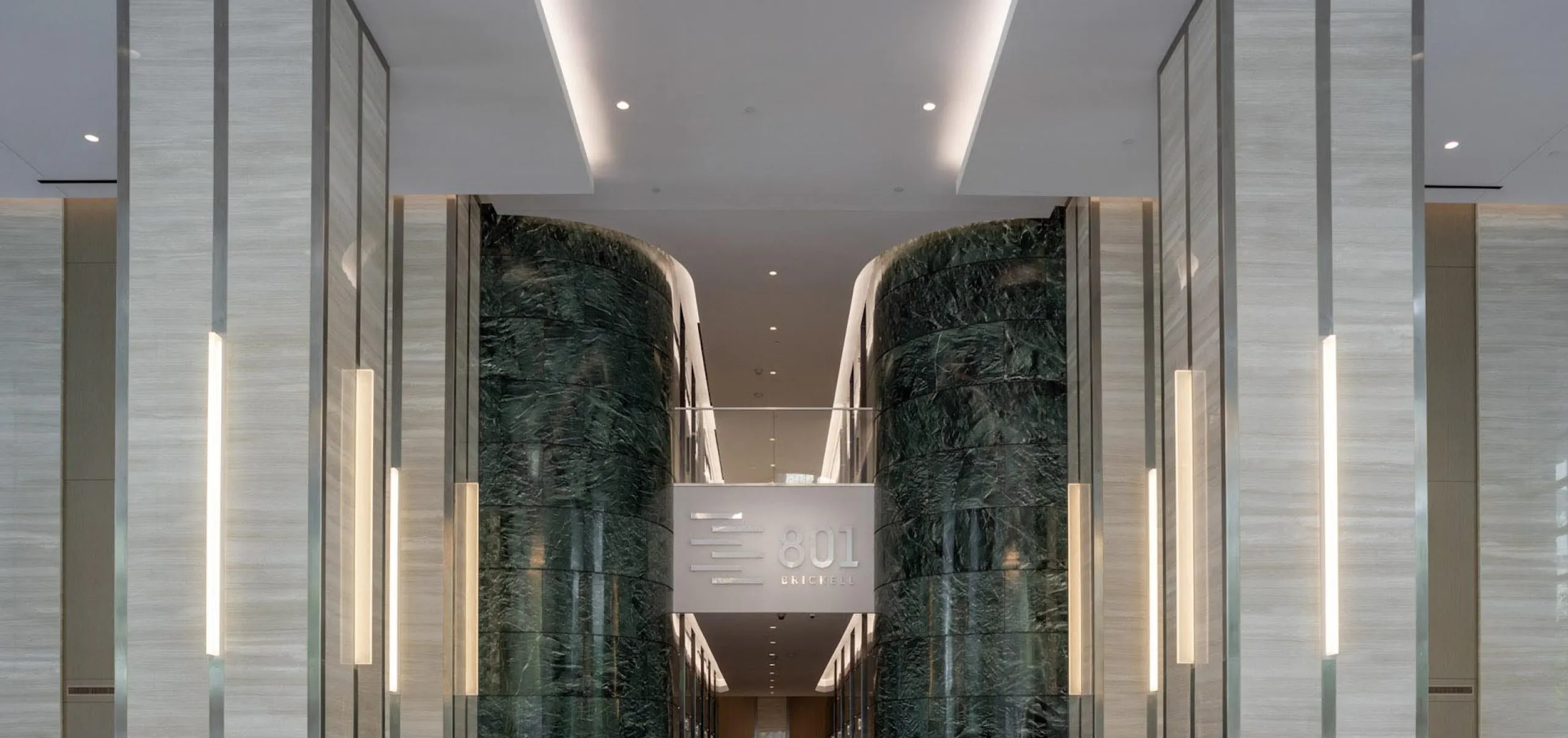 Modern upscale lobby with seating at 801 Brickell