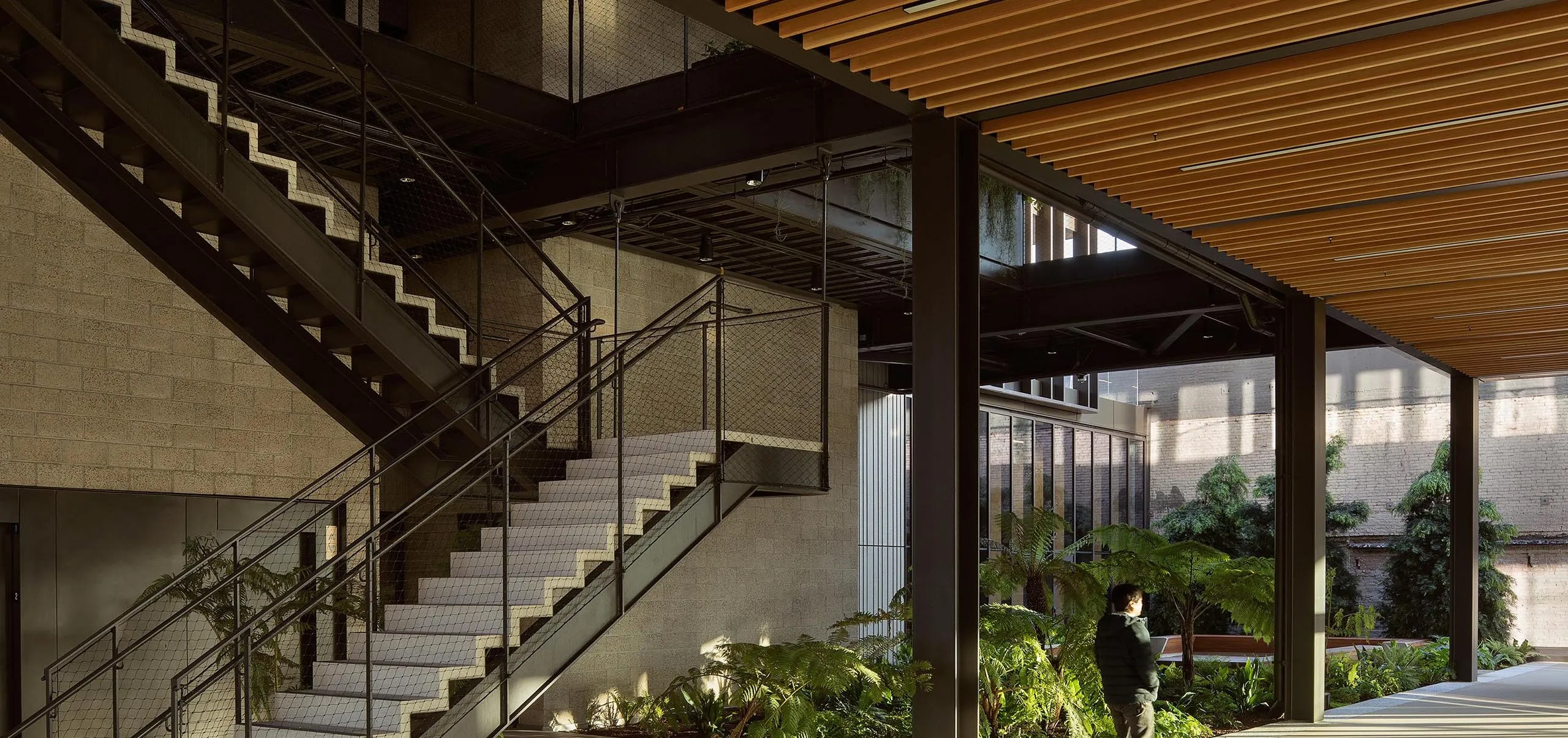 Exterior stairwell and covered walkway at 843 N Spring Street