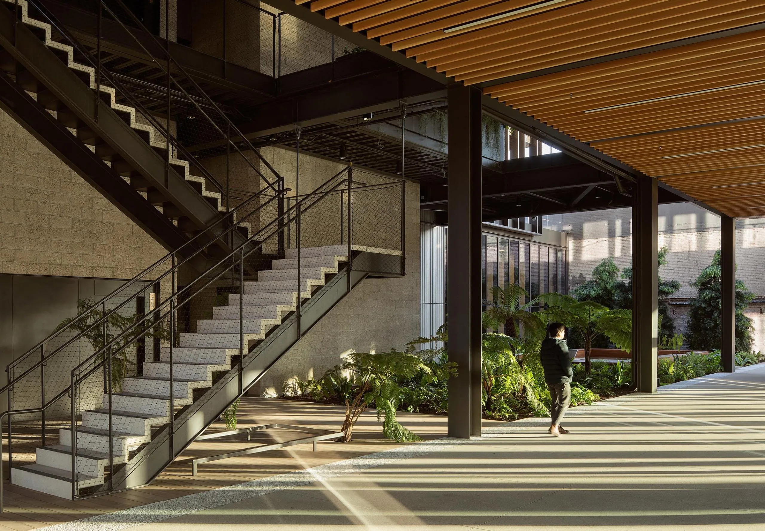 Exterior stairwell and covered walkway at 843 N Spring Street