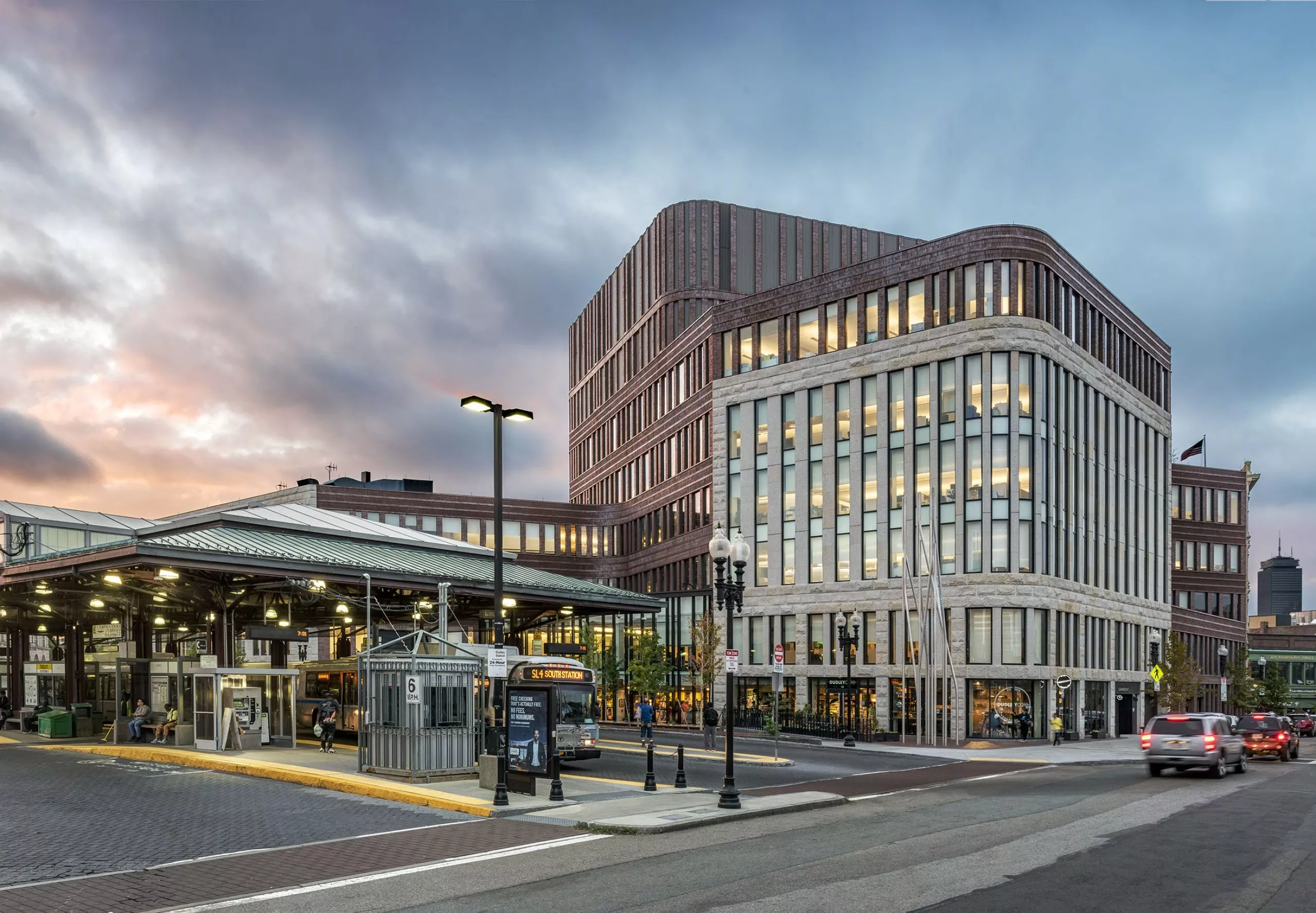 Exterior of bus station, road and municipal building