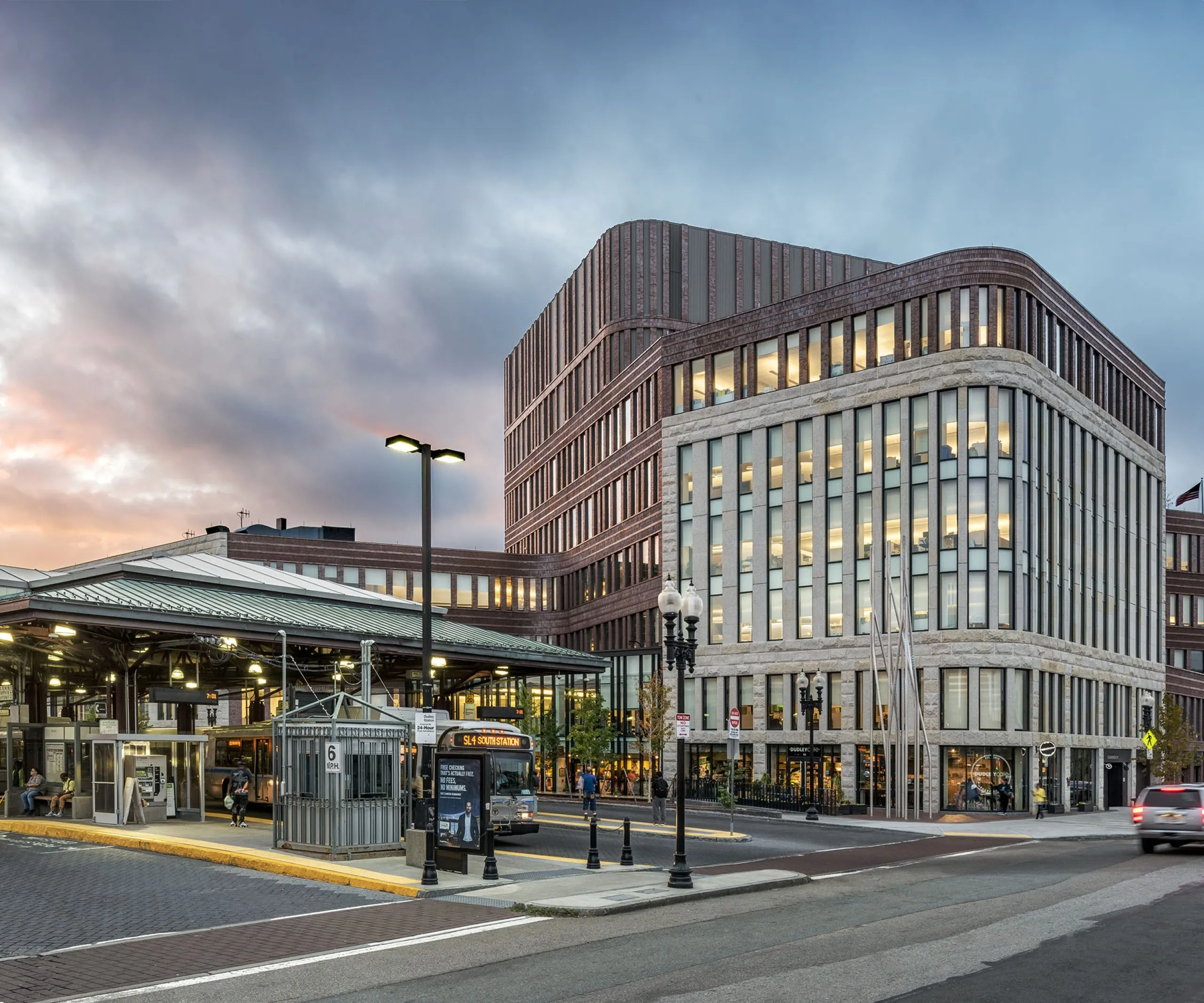 Exterior of bus station, road and municipal building