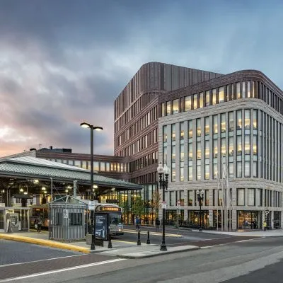 Exterior of bus station, road and municipal building