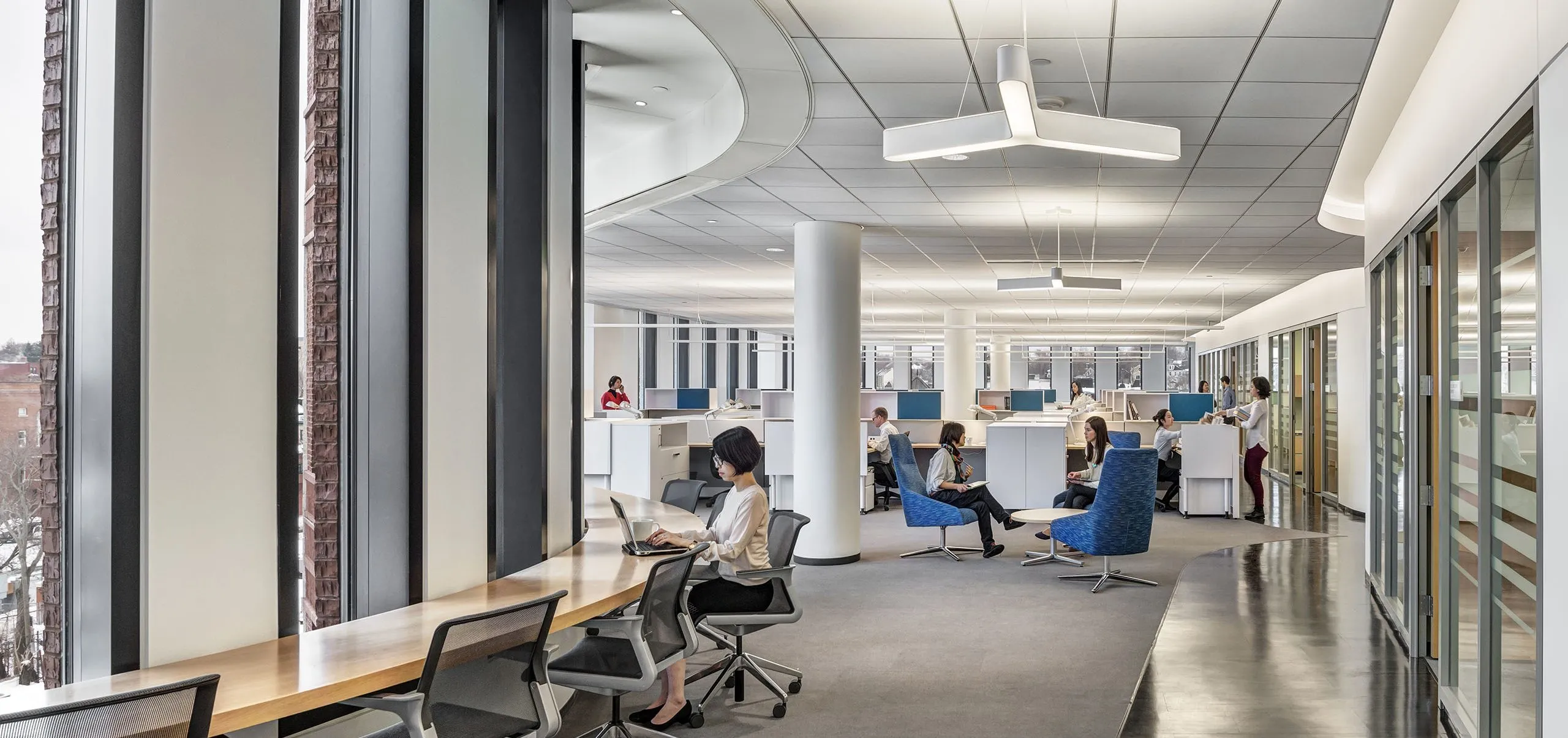 People sitting and working in interior office