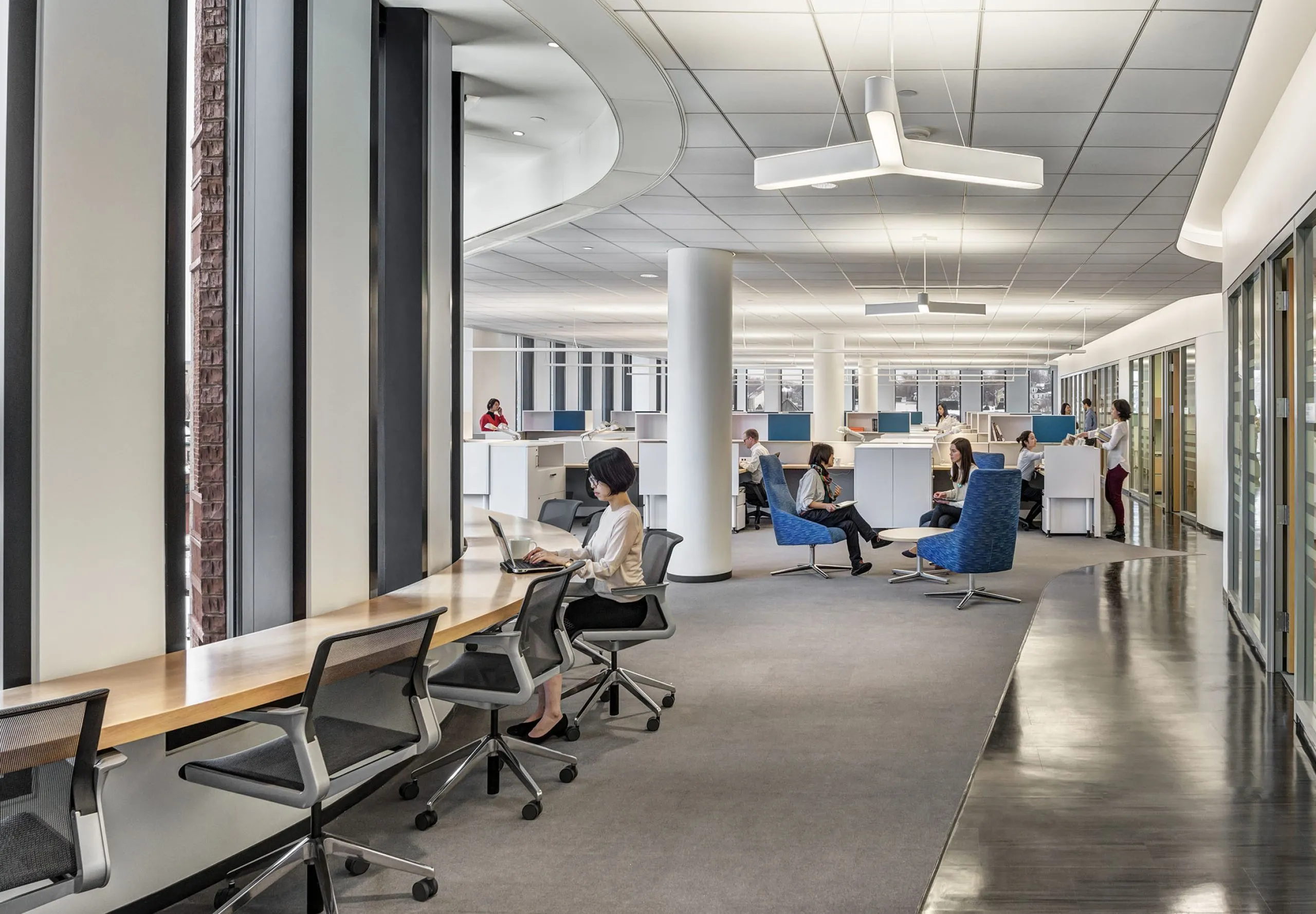 People sitting and working in interior office