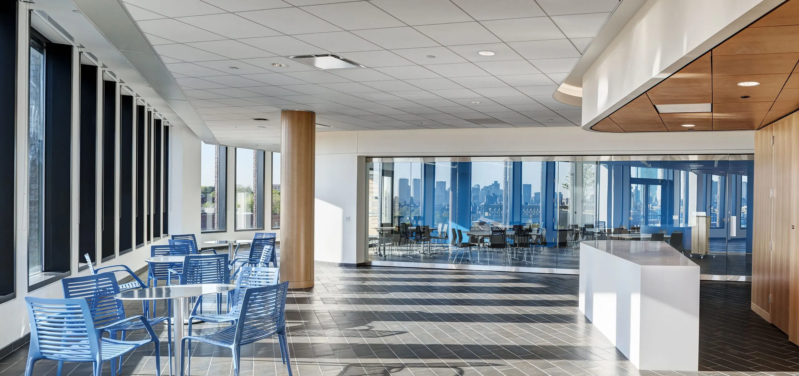 Kitchen and dining area with office spaces in the distances