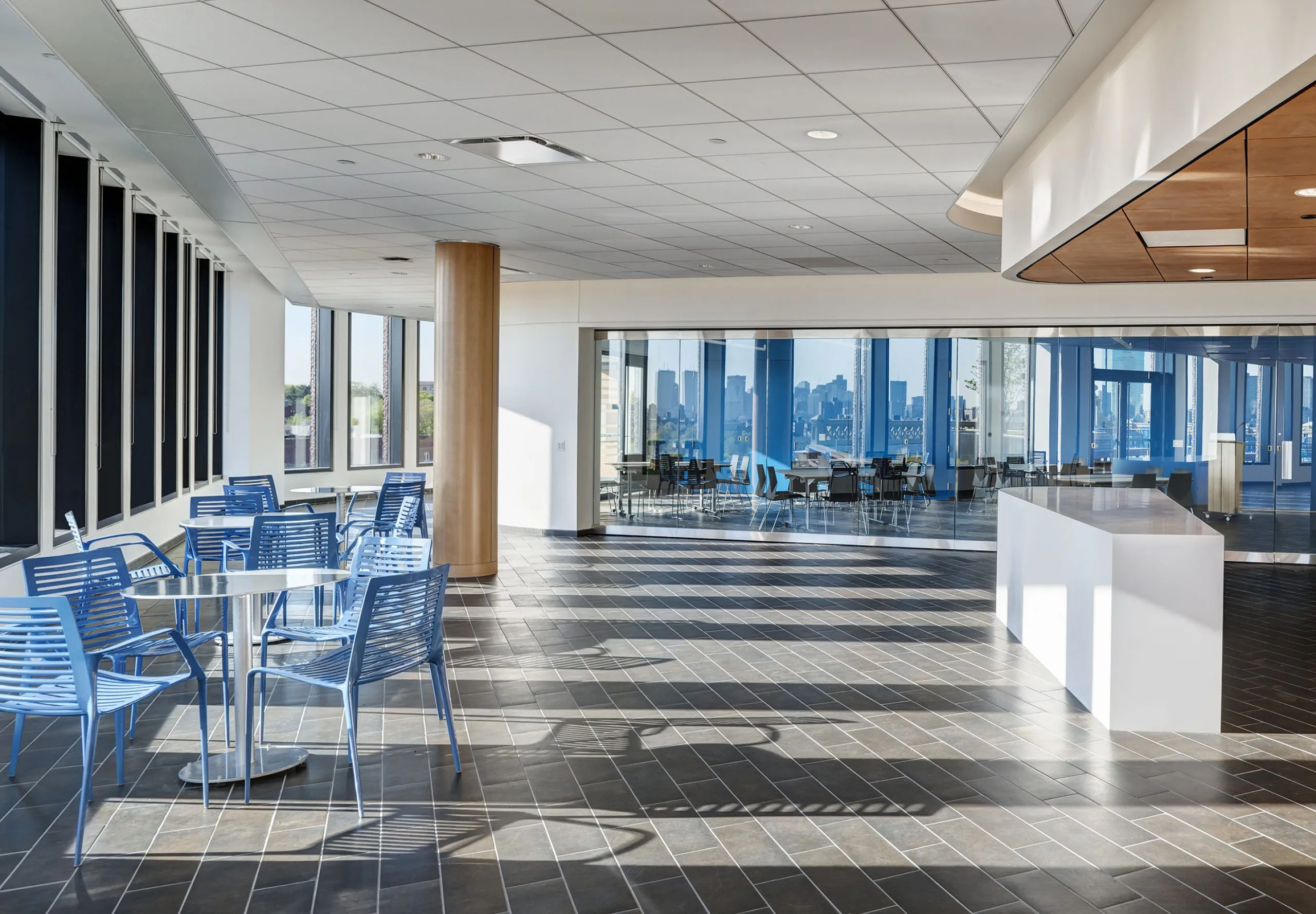 Kitchen and dining area with office spaces in the distances