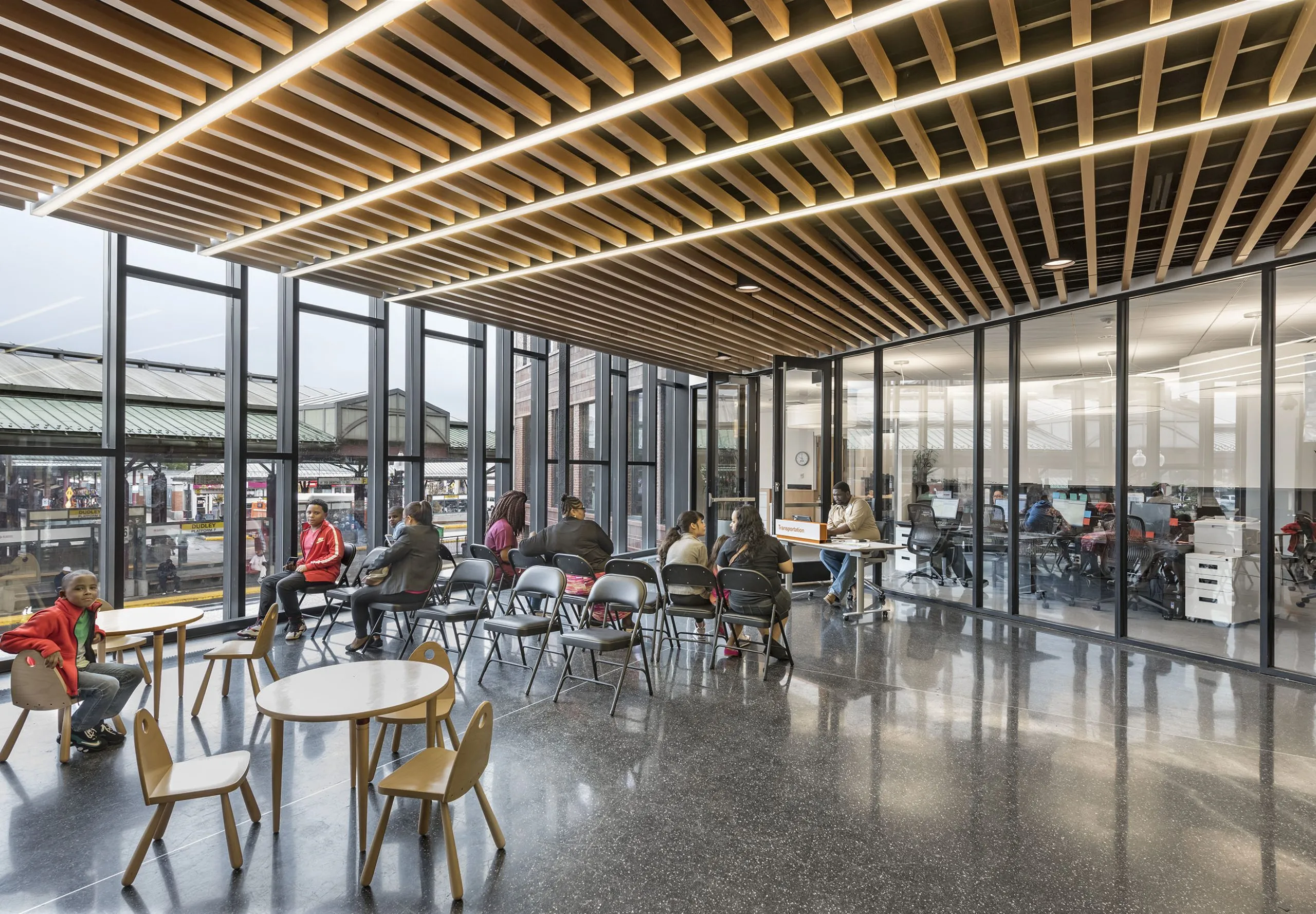 People sitting in waiting area in building