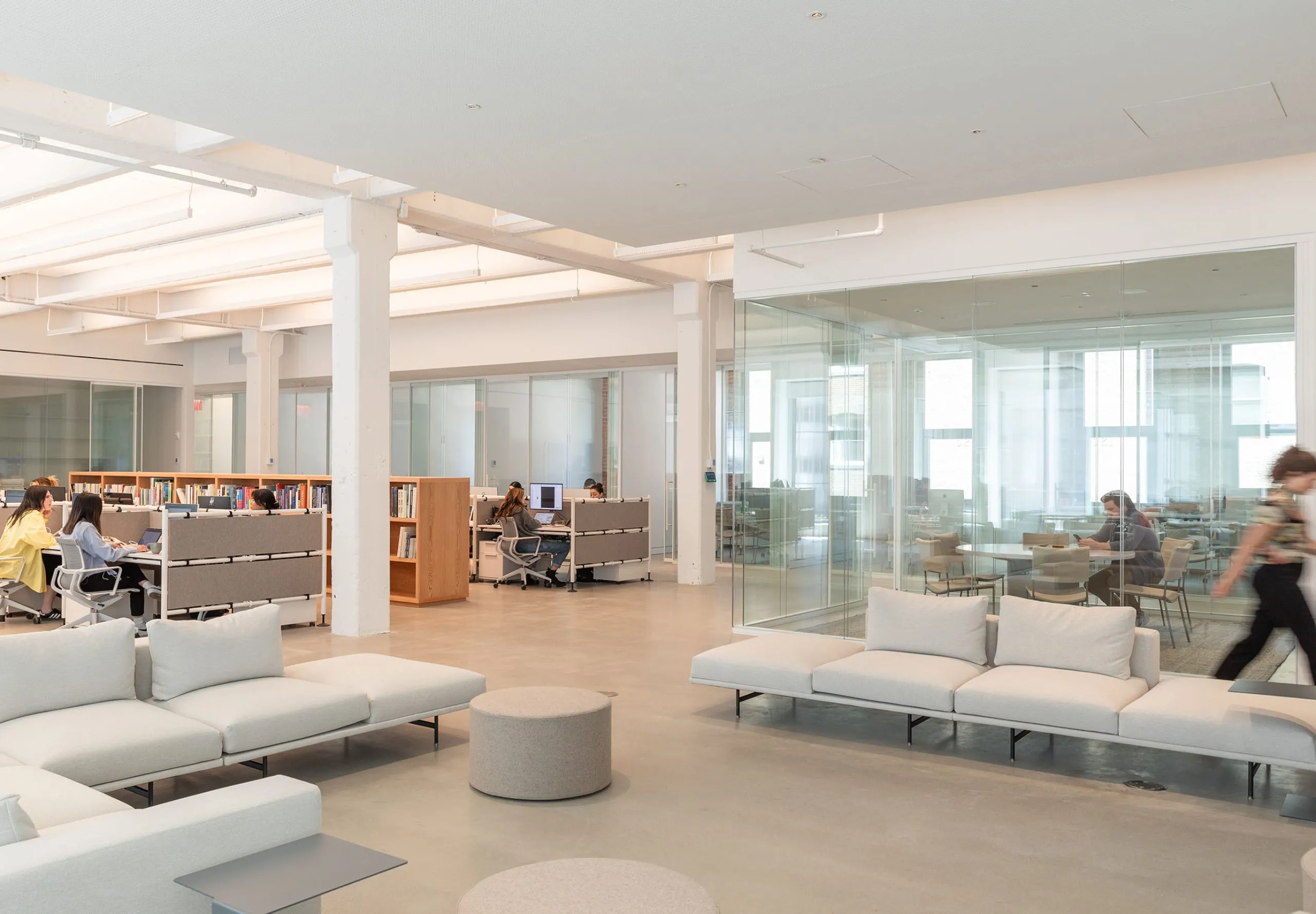 People working in office area and seating area at David Zwirner Headquarters