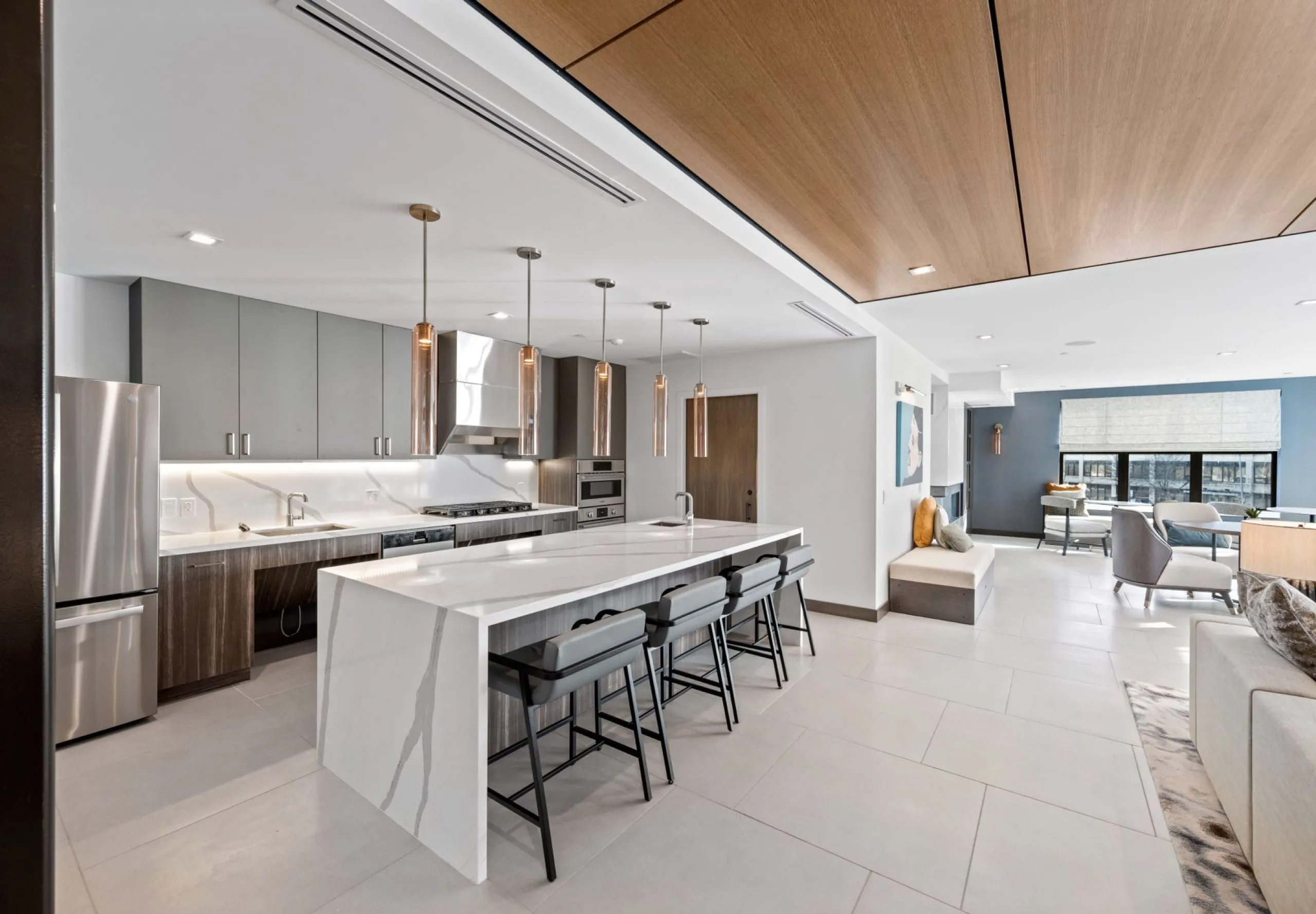 Modern kitchen and living space of apartment in Emblem 125