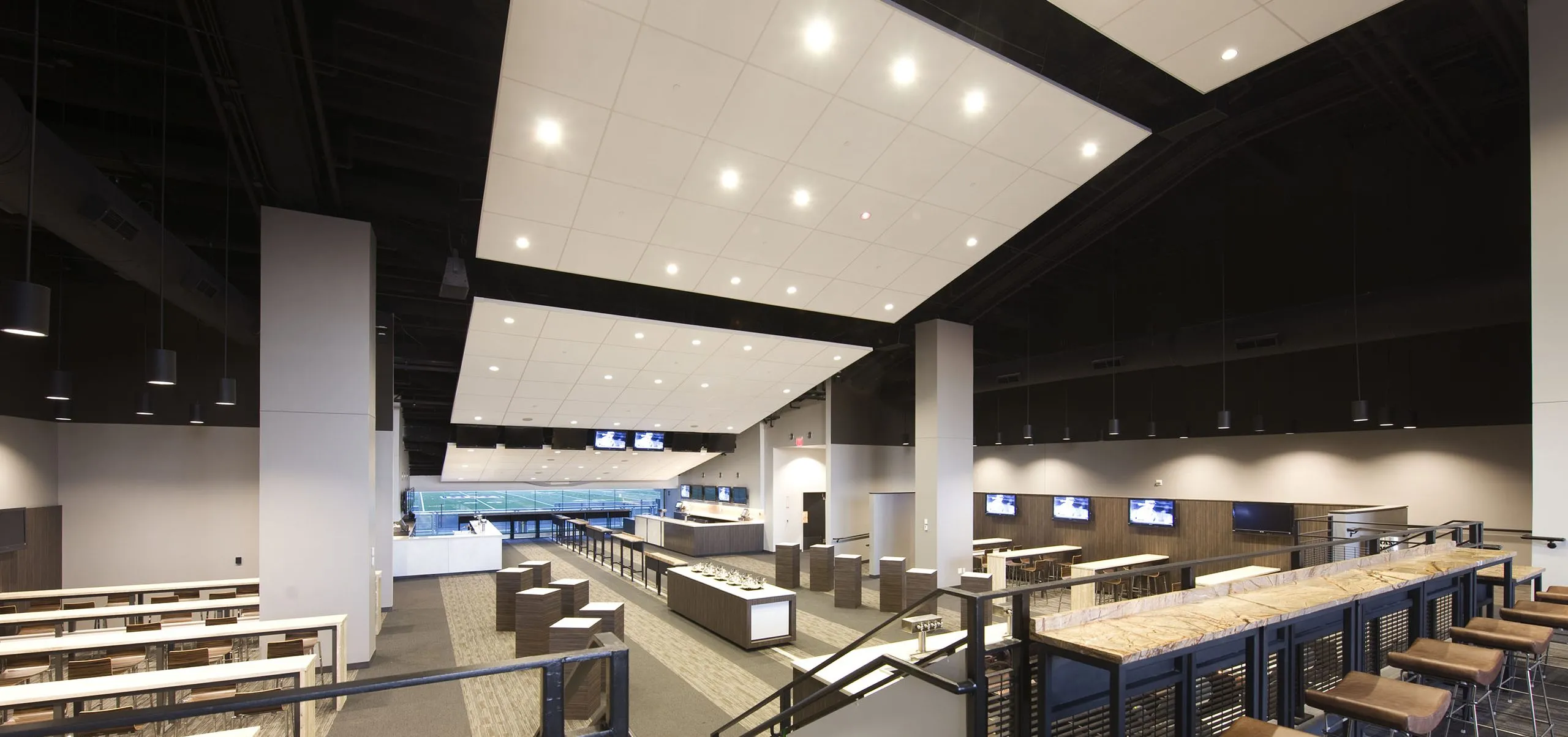 Large communal dining and meeting area at Metlife Stadium West Hall Club