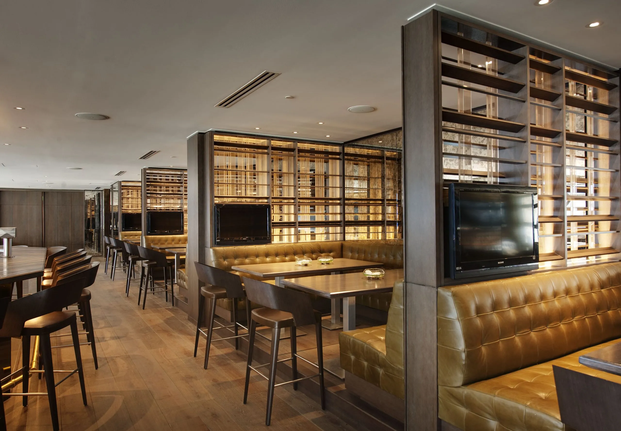 Large booths and bar at MetLife Stadium Jet's Team Room