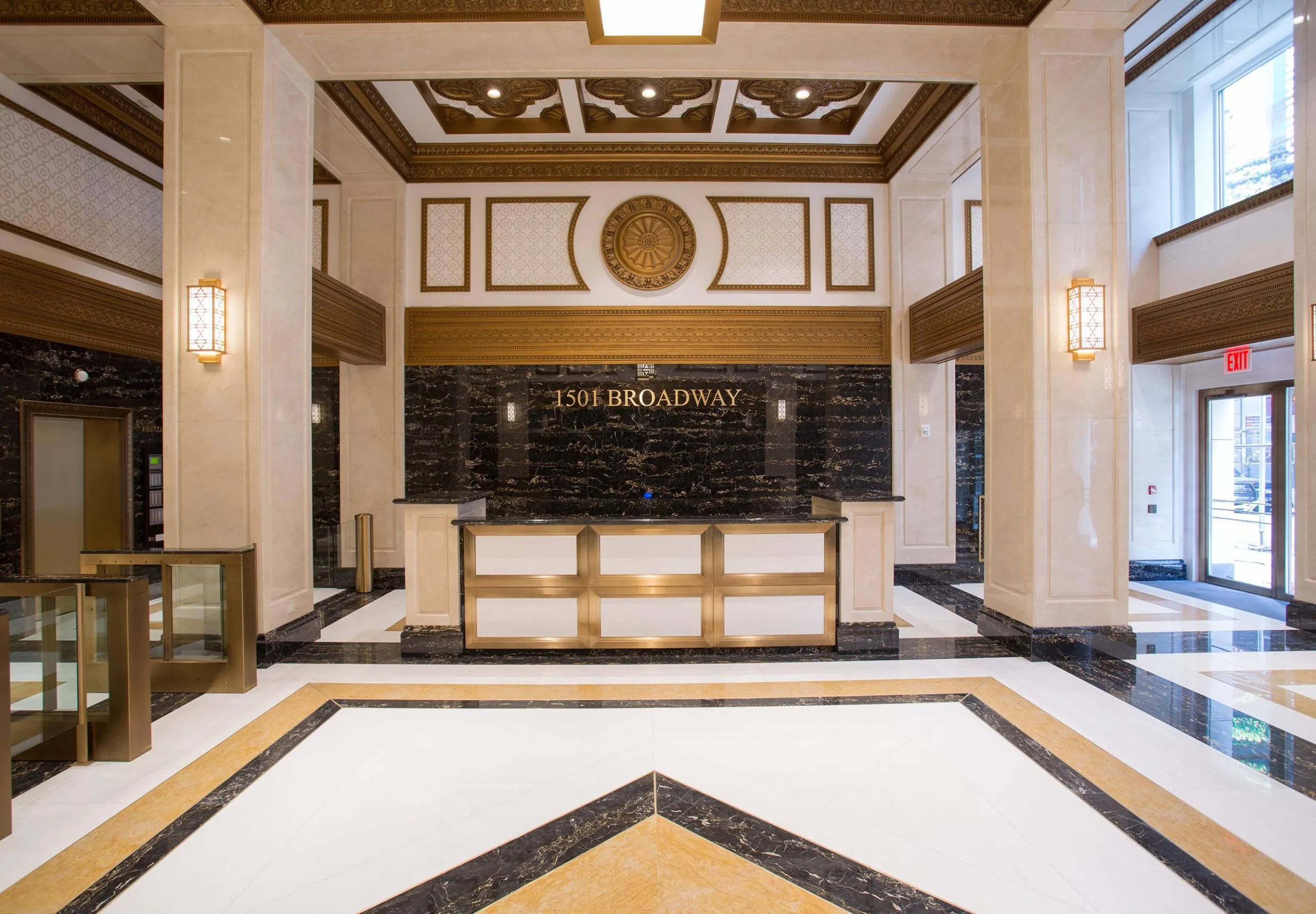 Front desk with golden accents at Paramount Building