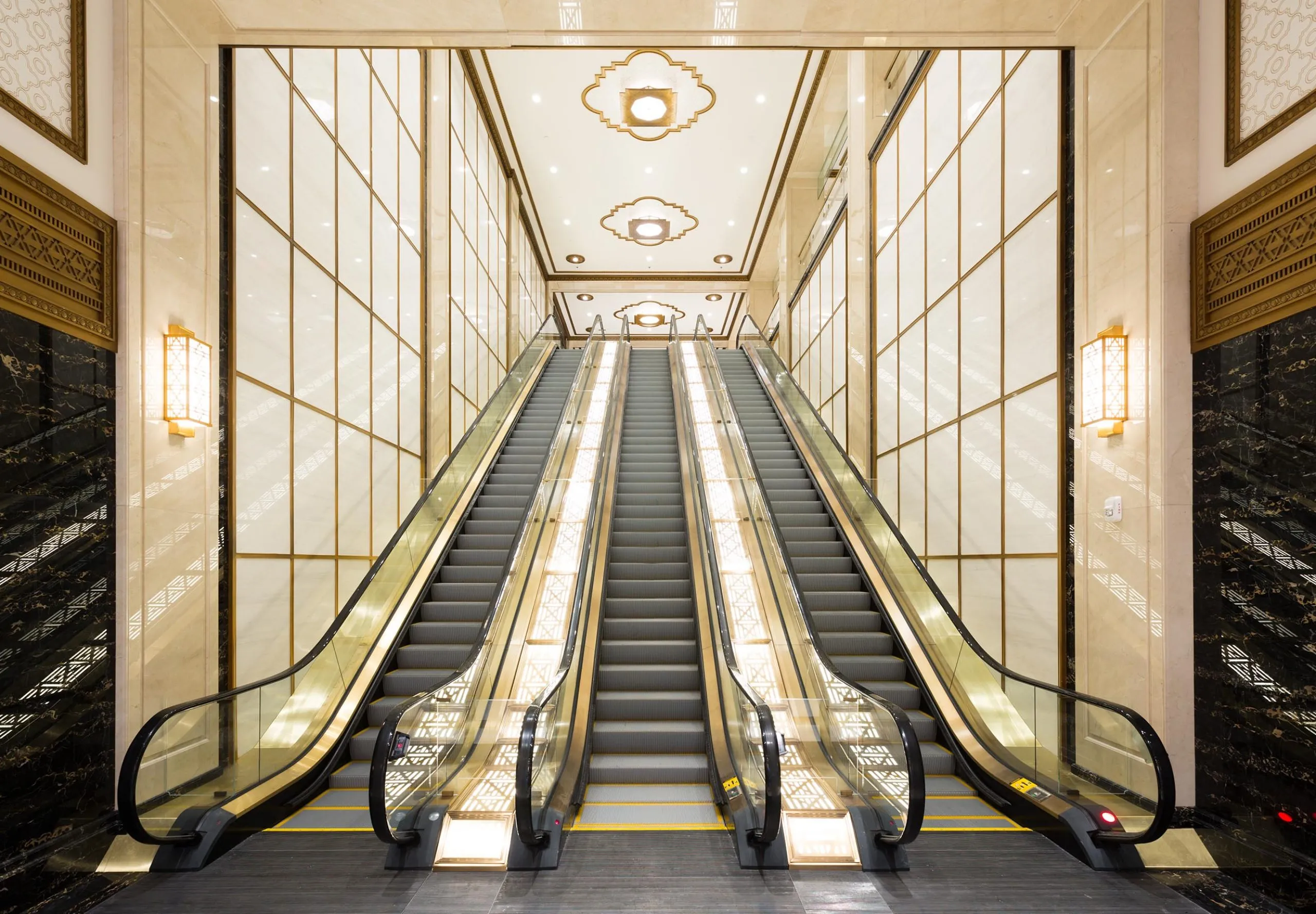 Escalators with golden accents at Paramount Building