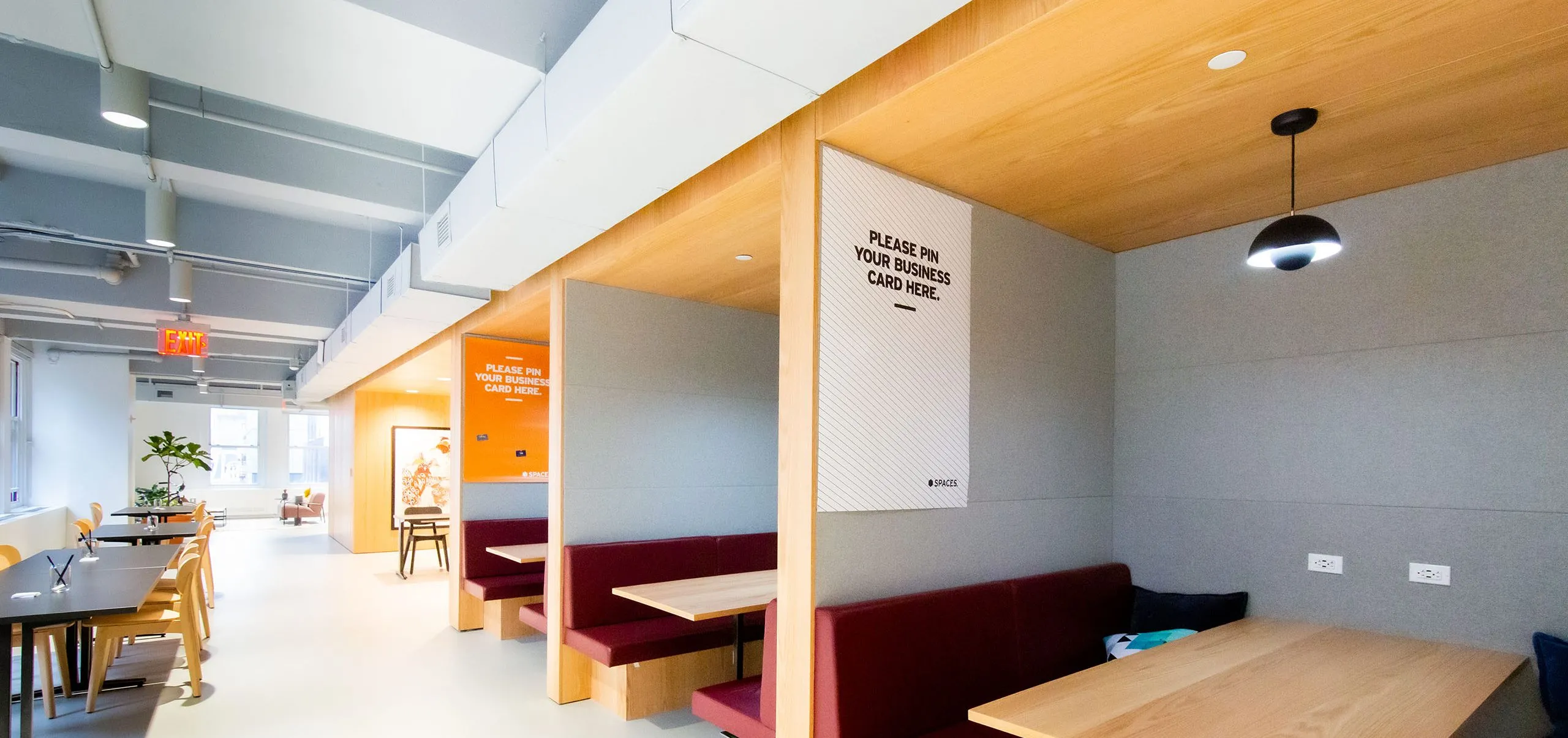 Dining tables and booths at Regus Penn Plaza