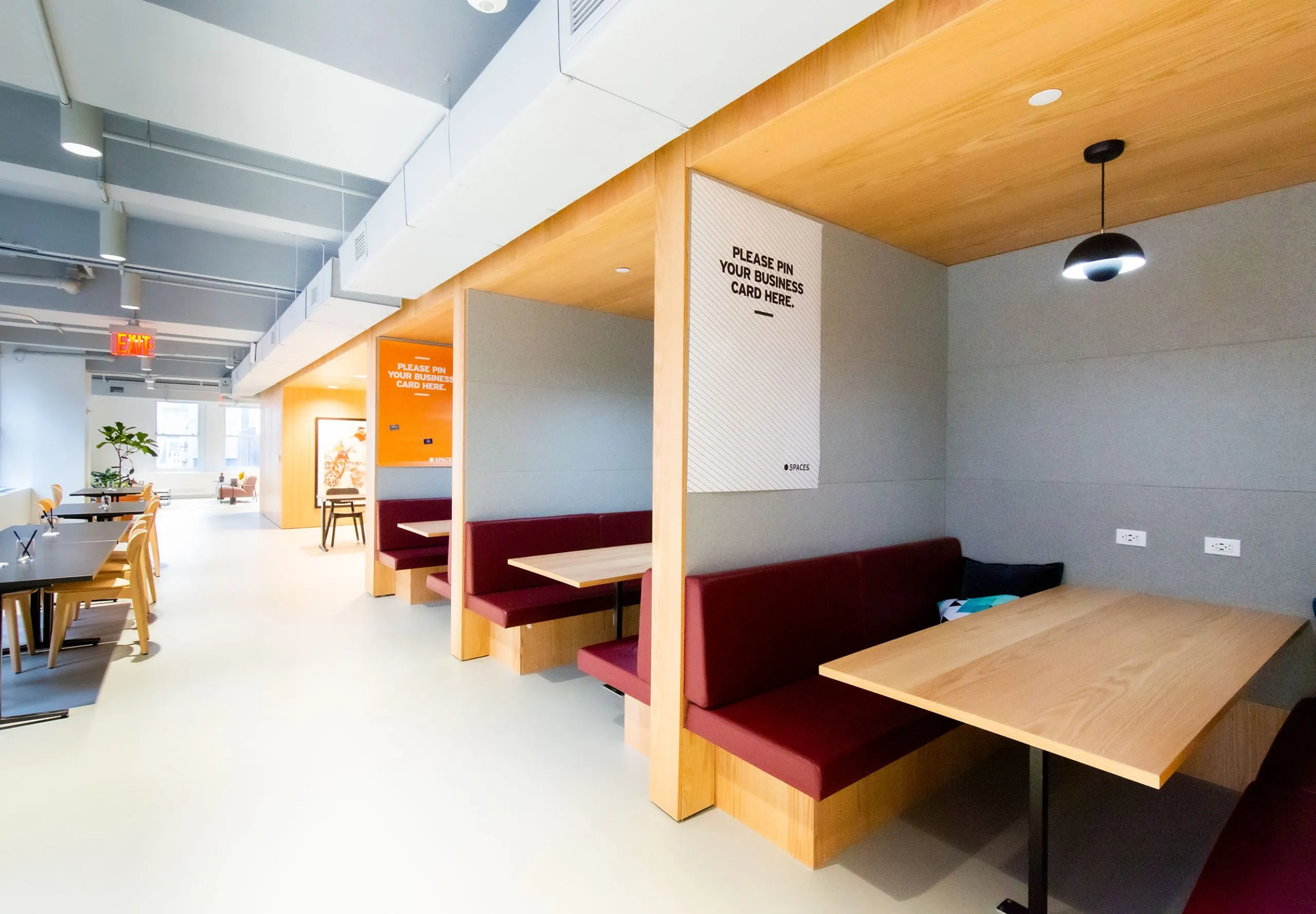 Dining tables and booths at Regus Penn Plaza