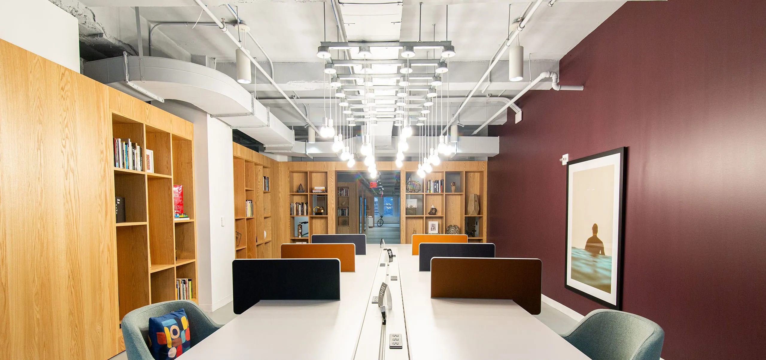 Open office space and bookshelves at Regus Penn Plaza