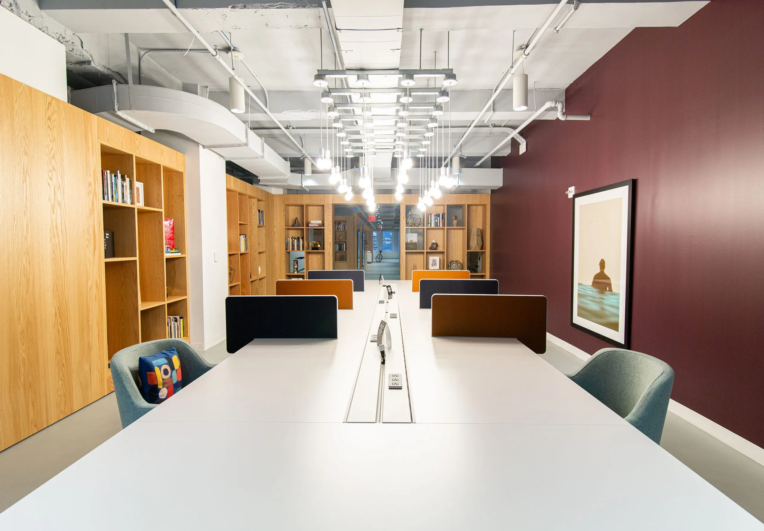 Open office space and bookshelves at Regus Penn Plaza