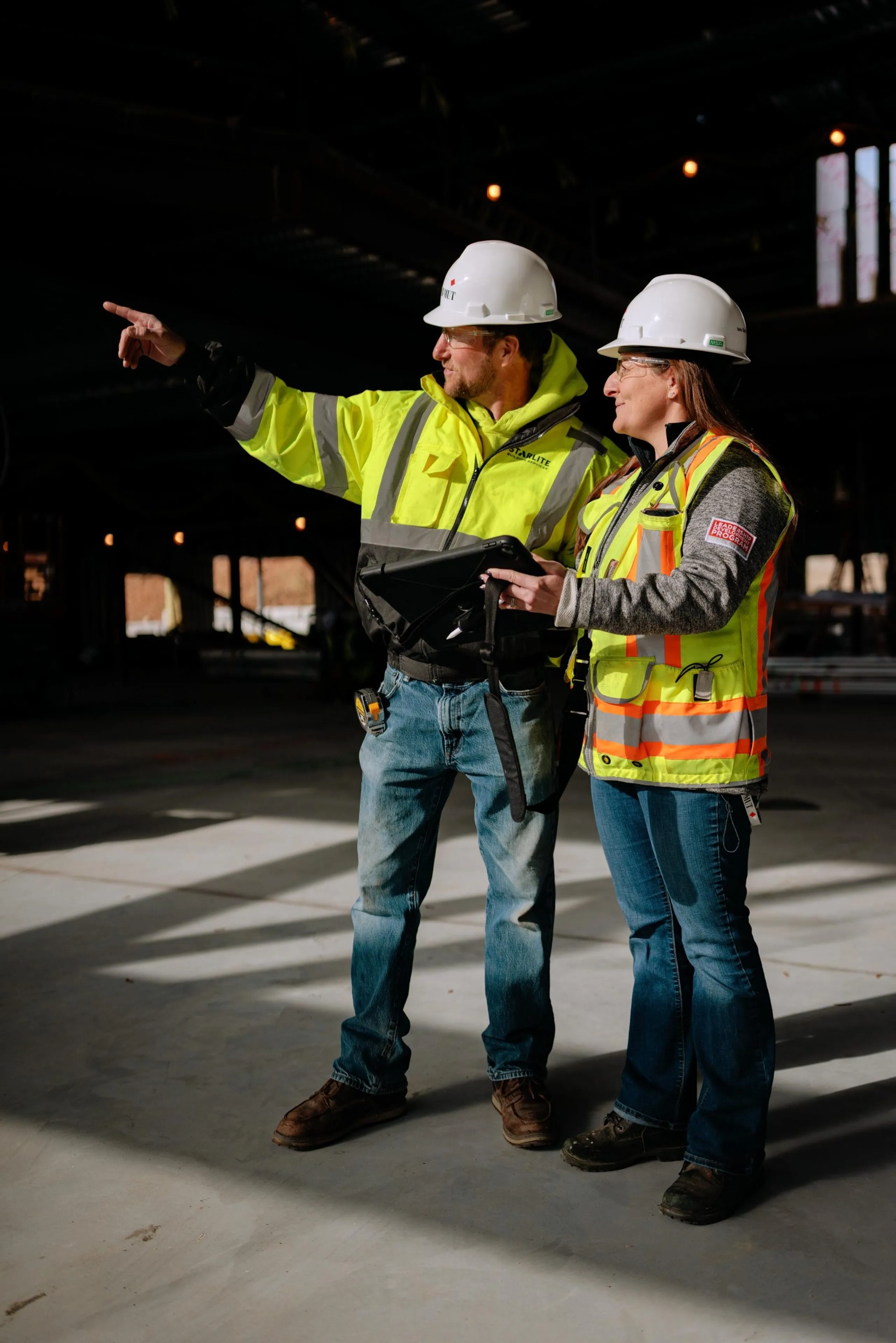 Shawmut team members using tablets and technology