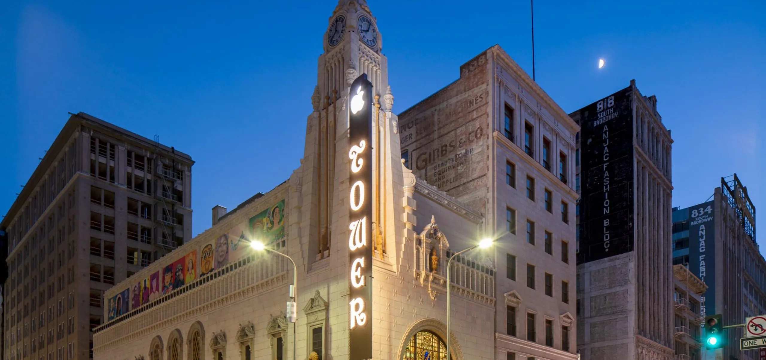 exterior view of the Apple Tower Theatre lit up at night