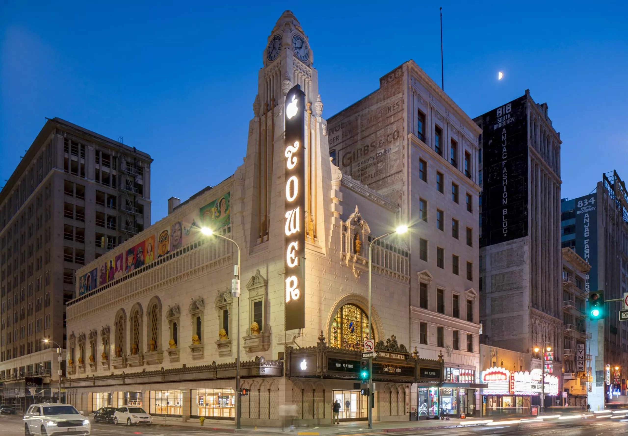 exterior view of the Apple Tower Theatre lit up at night