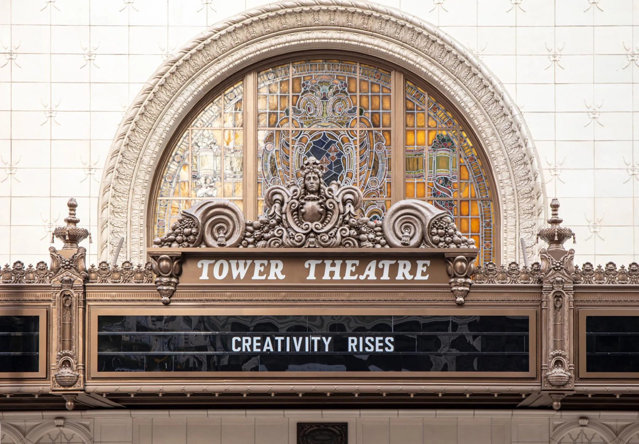 exterior view of the sign on the Apple Tower Theatre