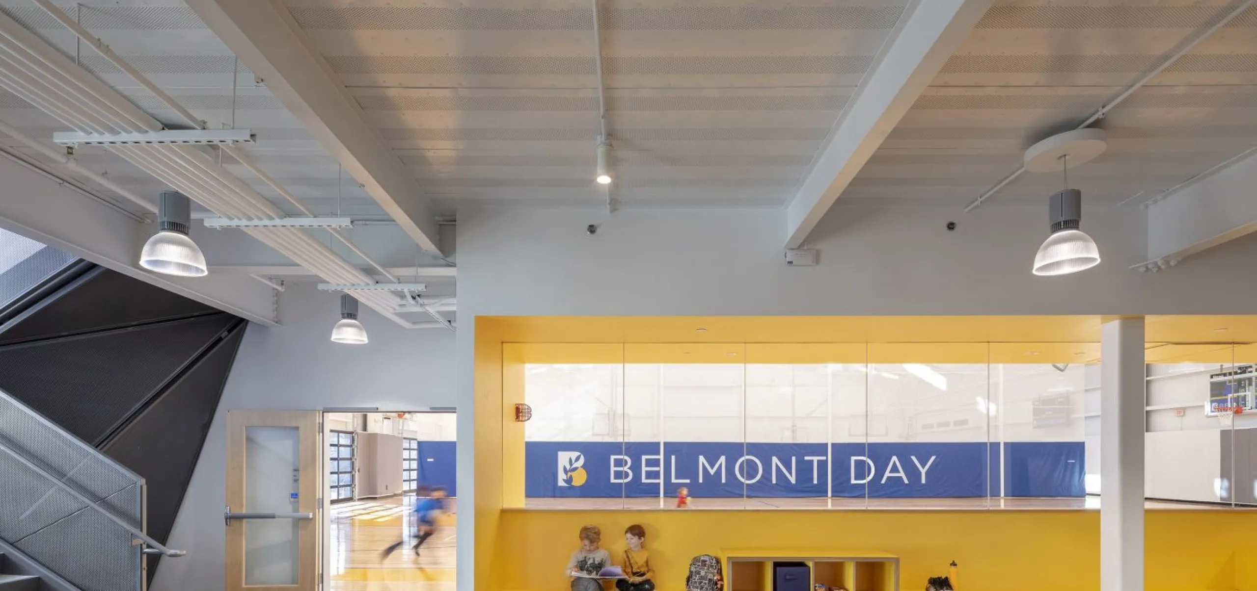 Children sitting on cubbies at Belmont Day School