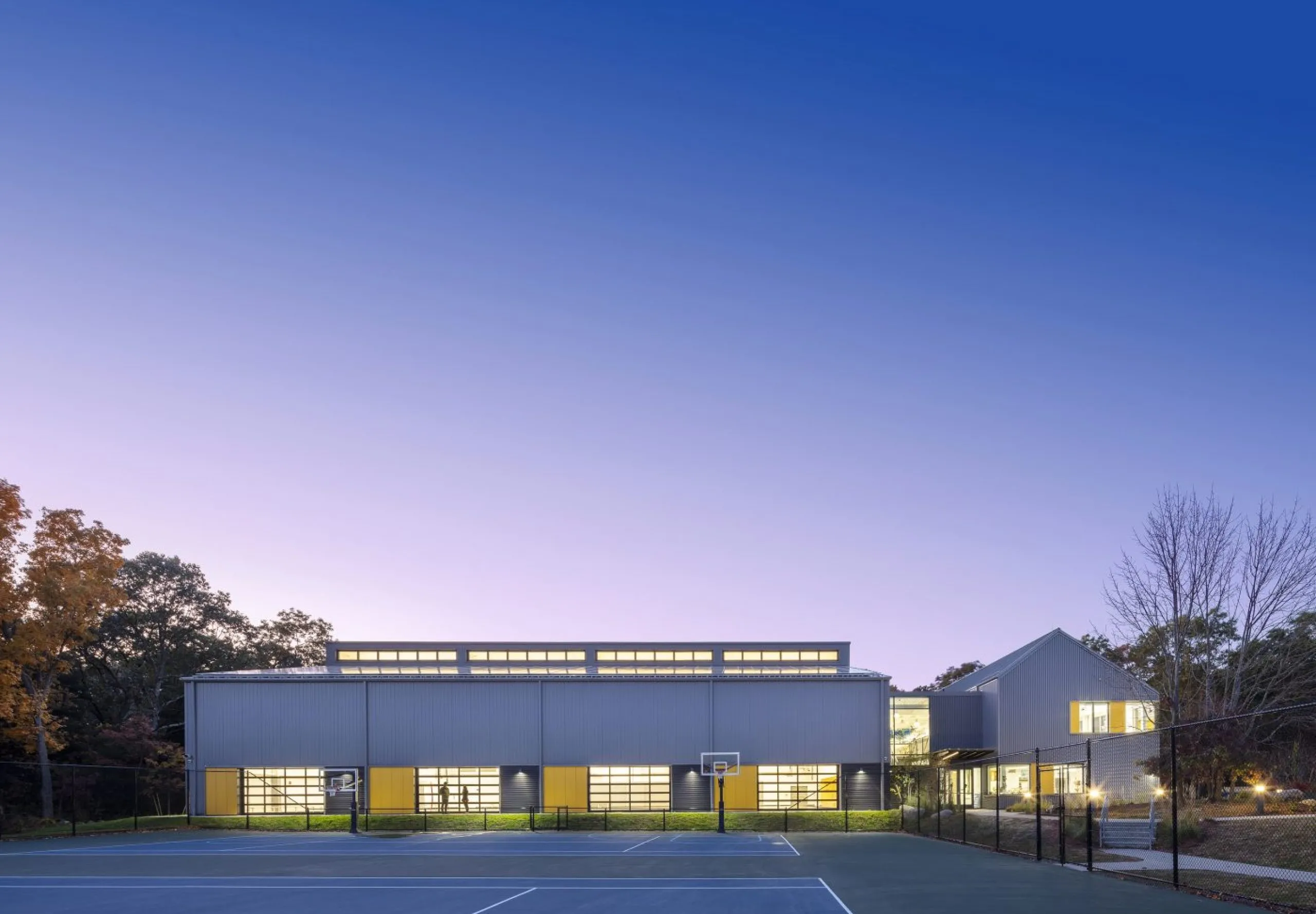 exterior view of the Belmont Say School Barn at night