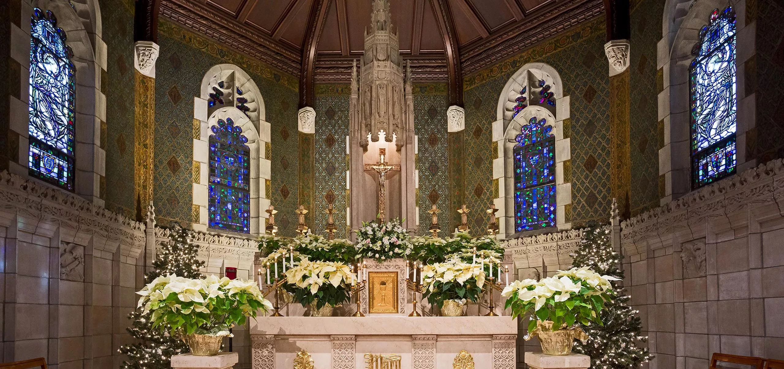 a altar with flowers and lights