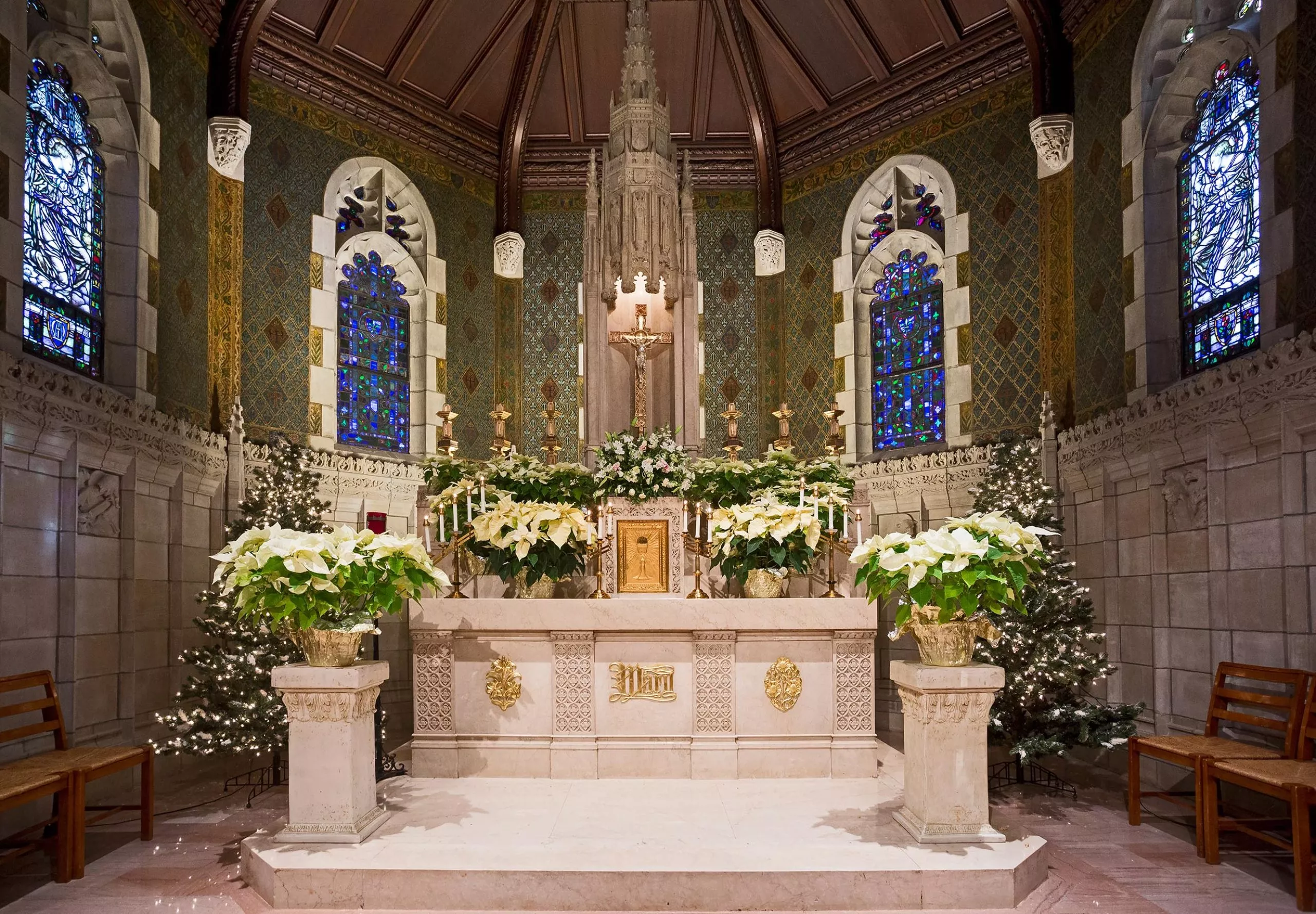 a altar with flowers and lights