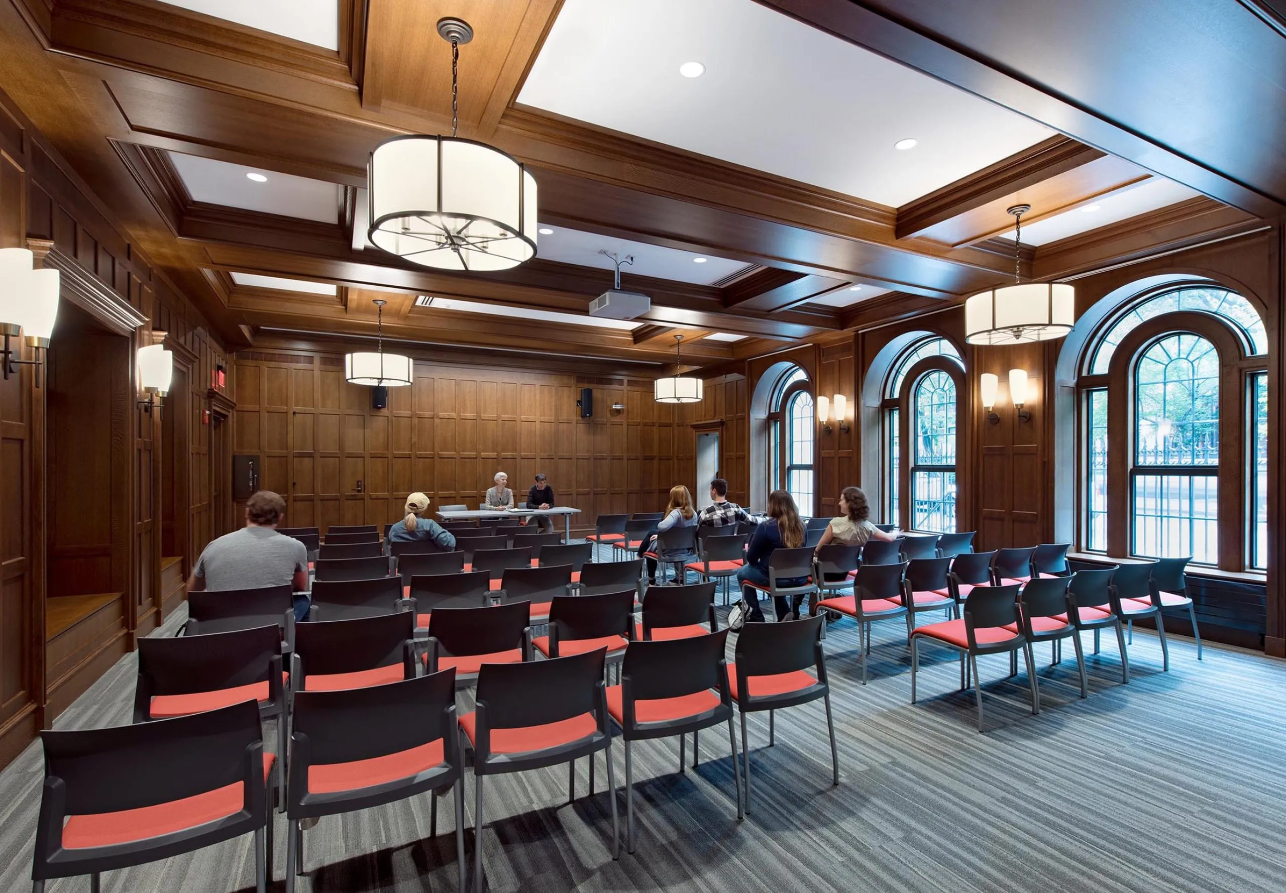 People in small auditorium room at Boston University 610 Beacon Street Dorms