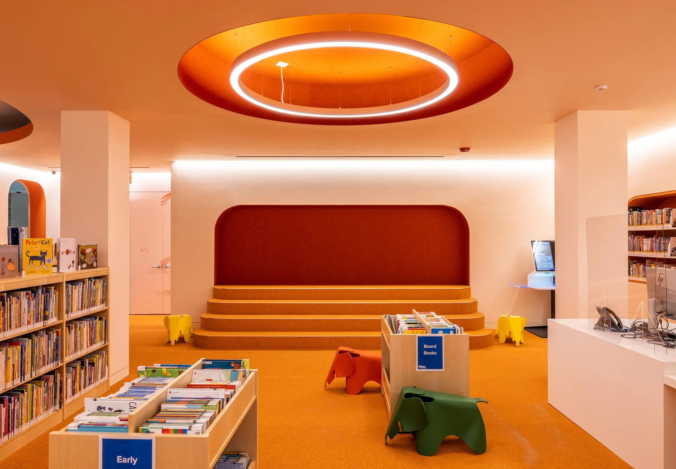 Children's room in Adams Street Library with brightly colored decorations and bookshelves