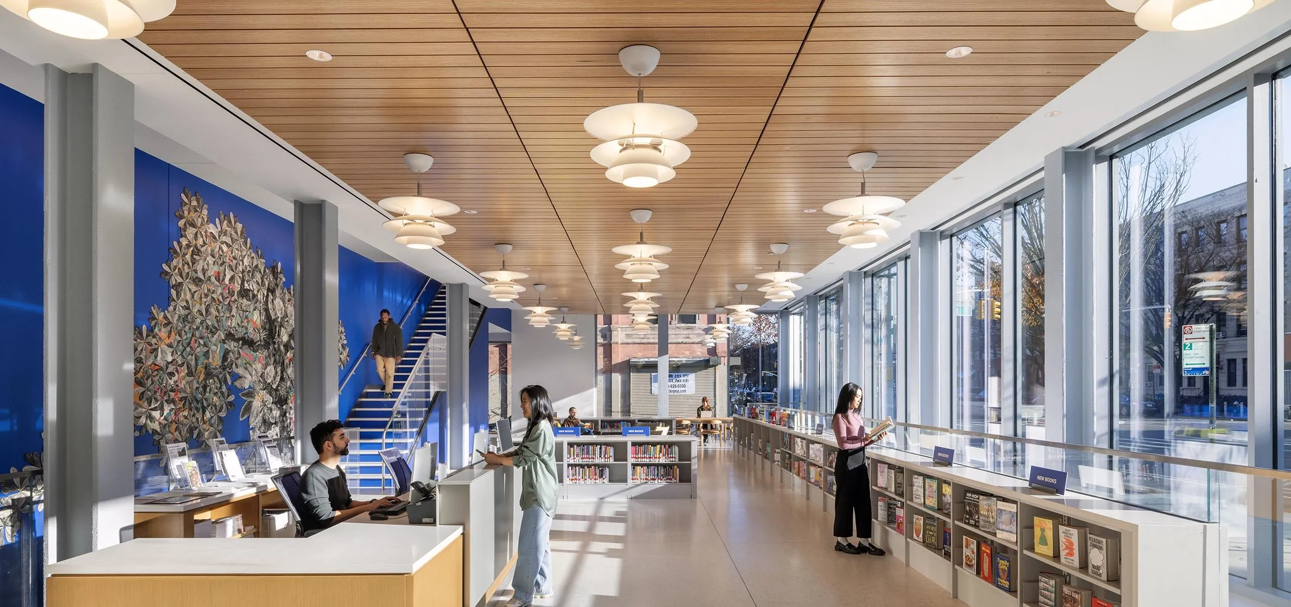 Front desk and bookshelves at Sunset Park Library