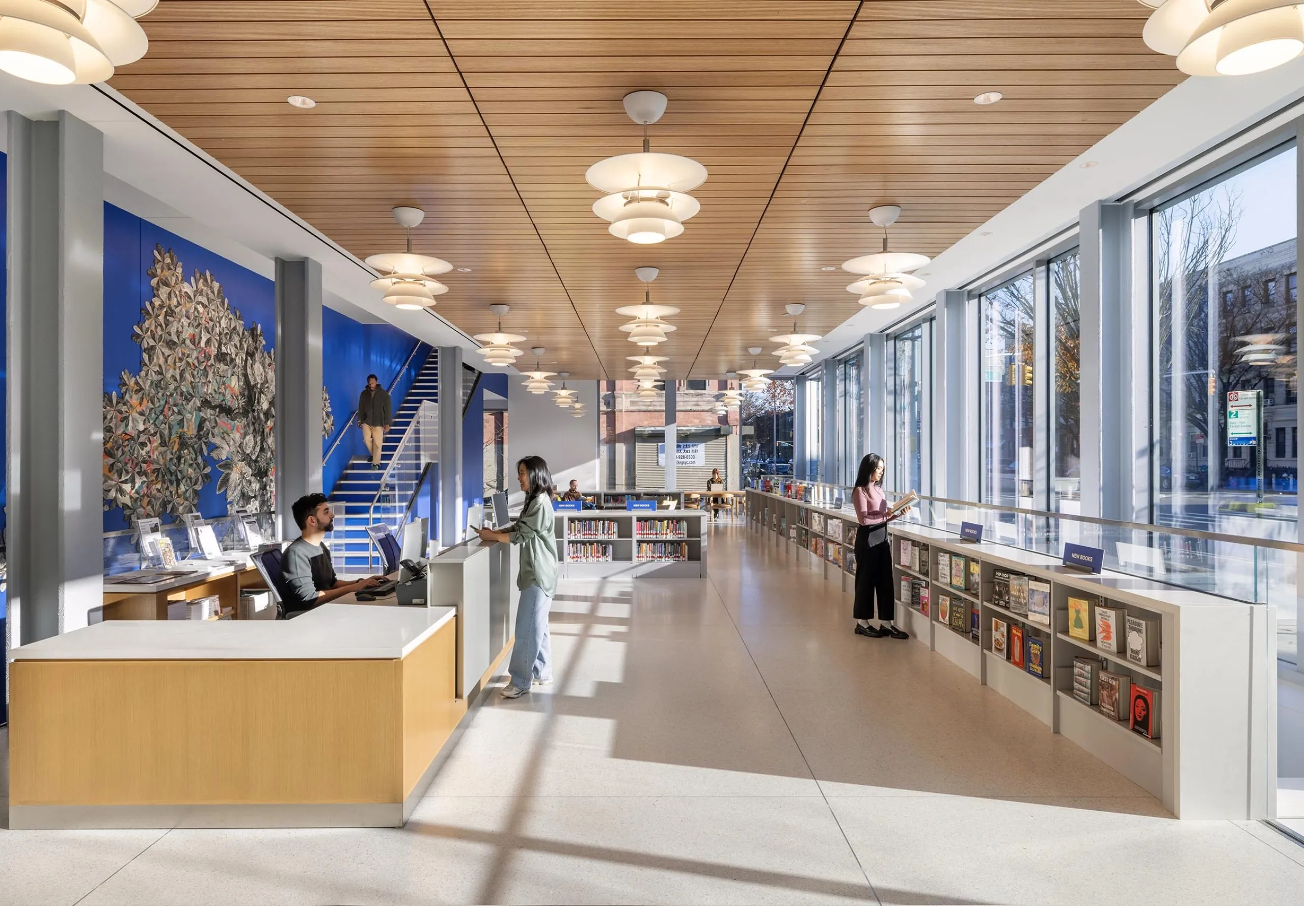 Front desk and bookshelves at Sunset Park Library