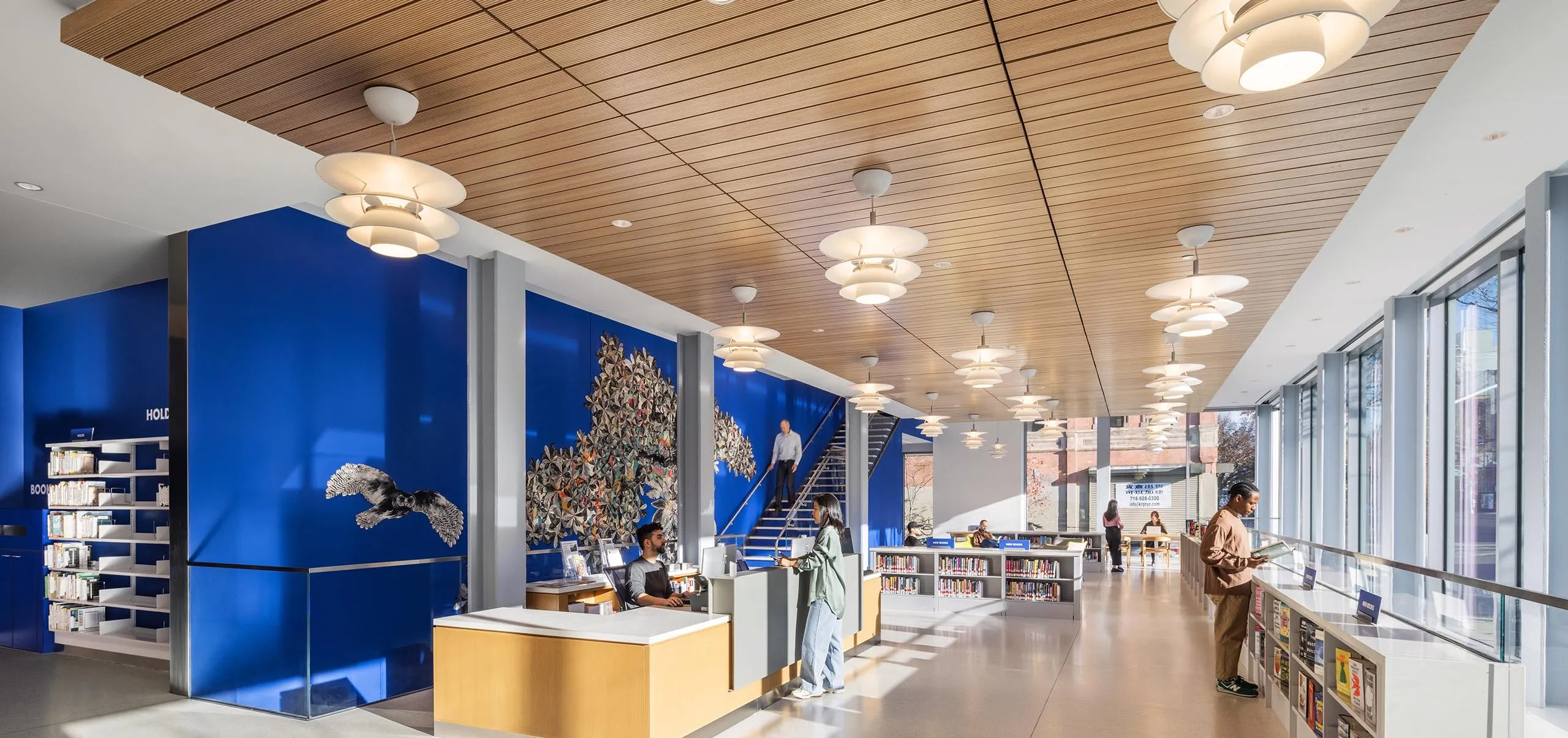 Front desk and bookshelves at Sunset Park Library