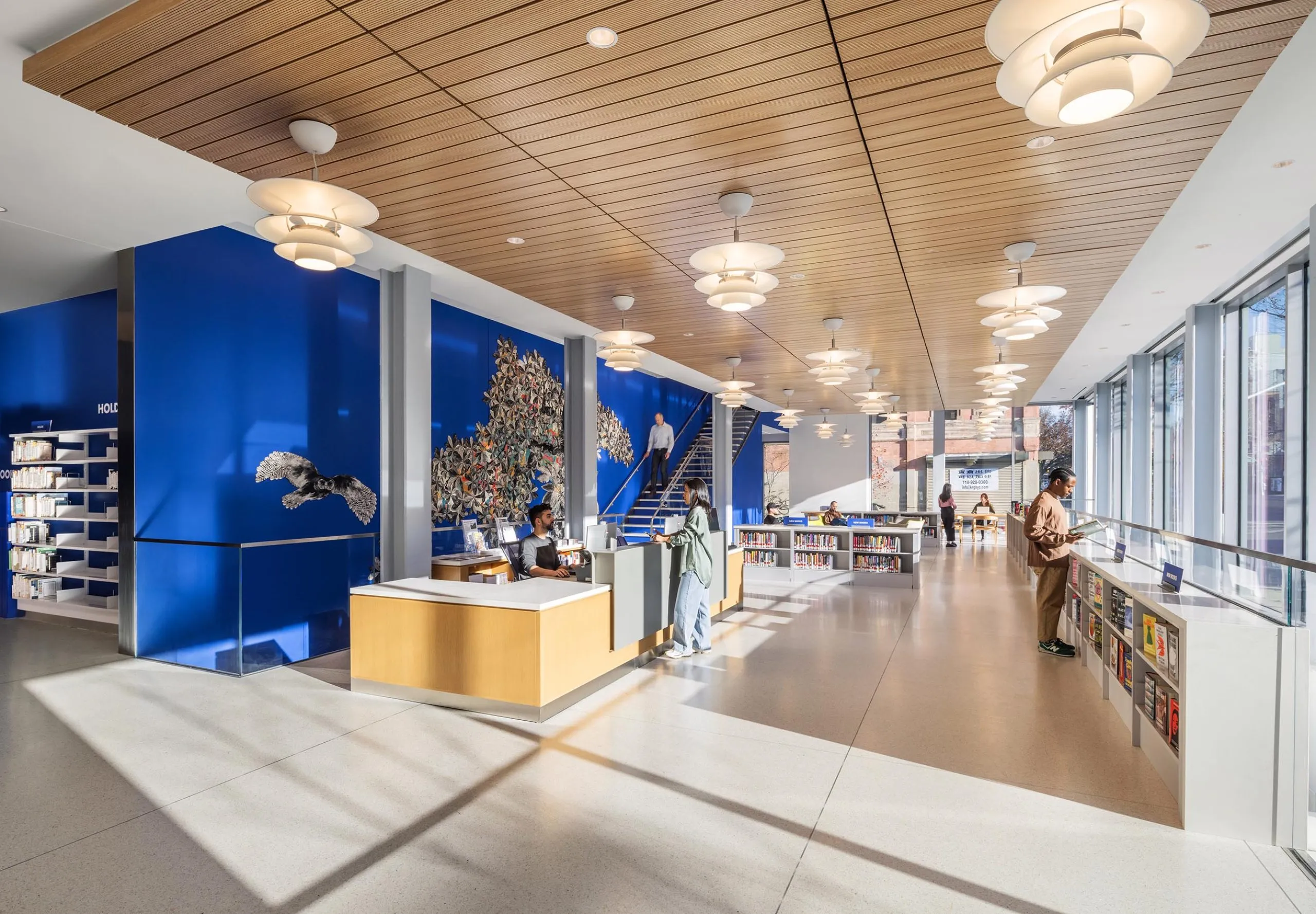 Front desk and bookshelves at Sunset Park Library