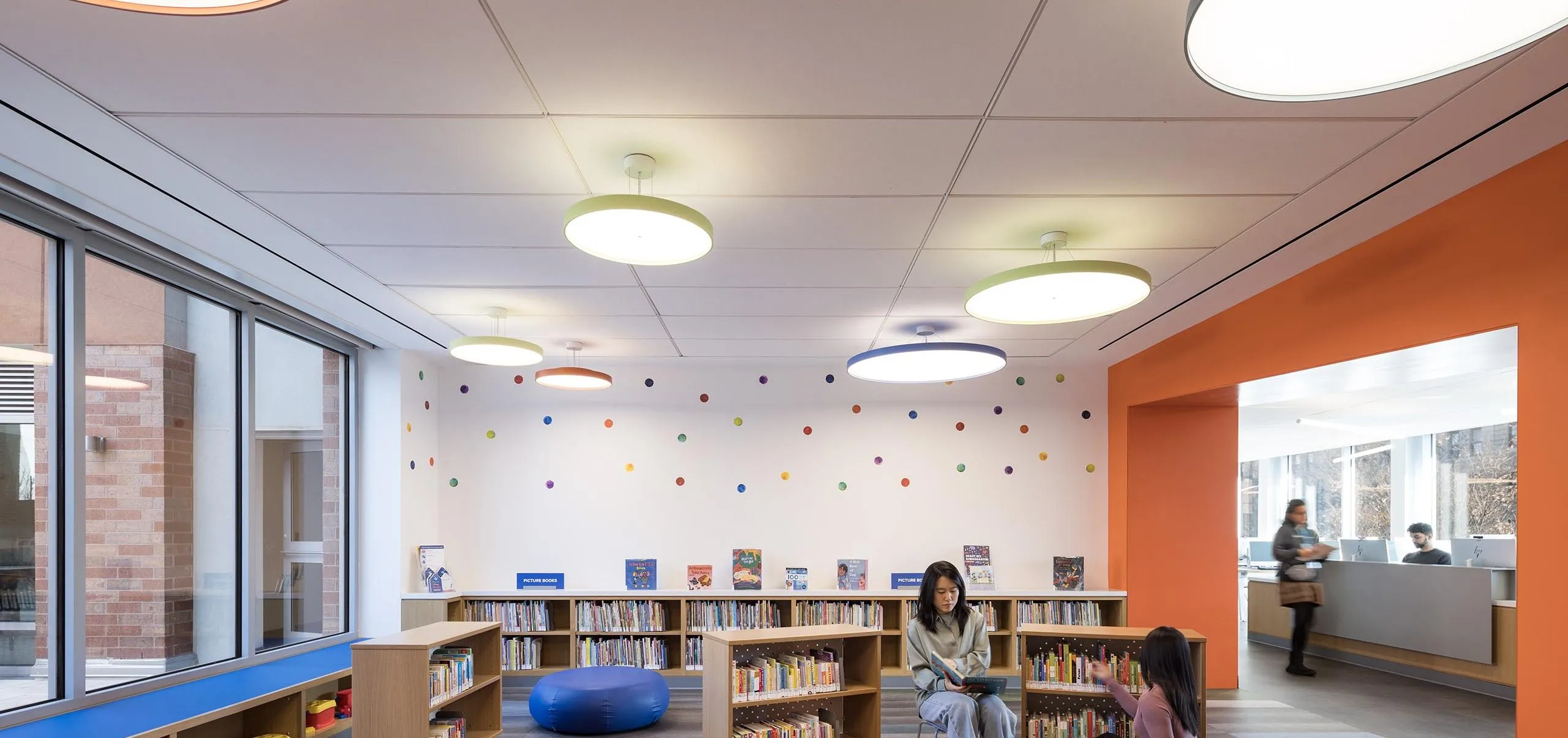 Children's area with toys and bookshelves at Sunset Park Library