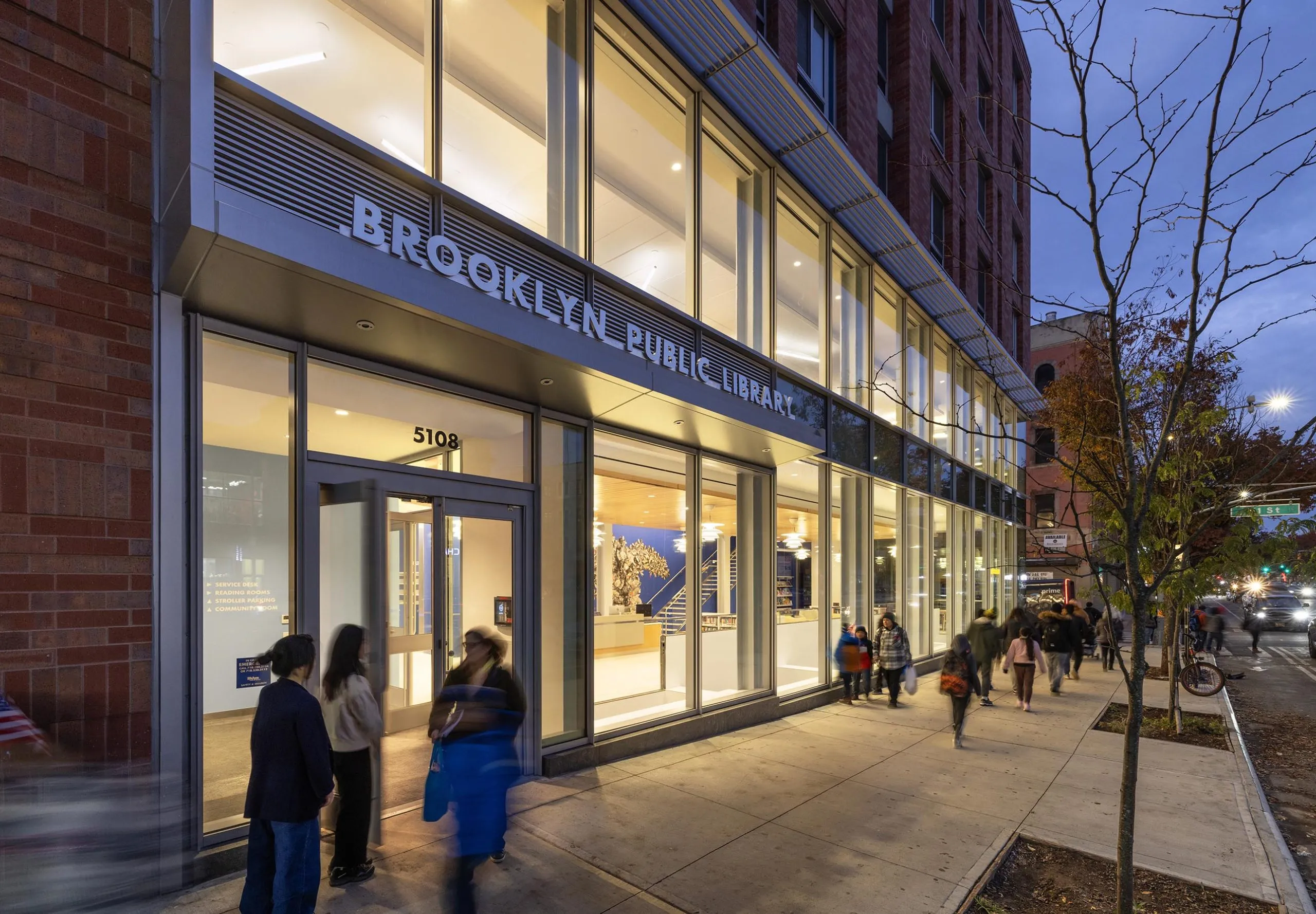 Outdoor street view of entryway to Sunset Park Library