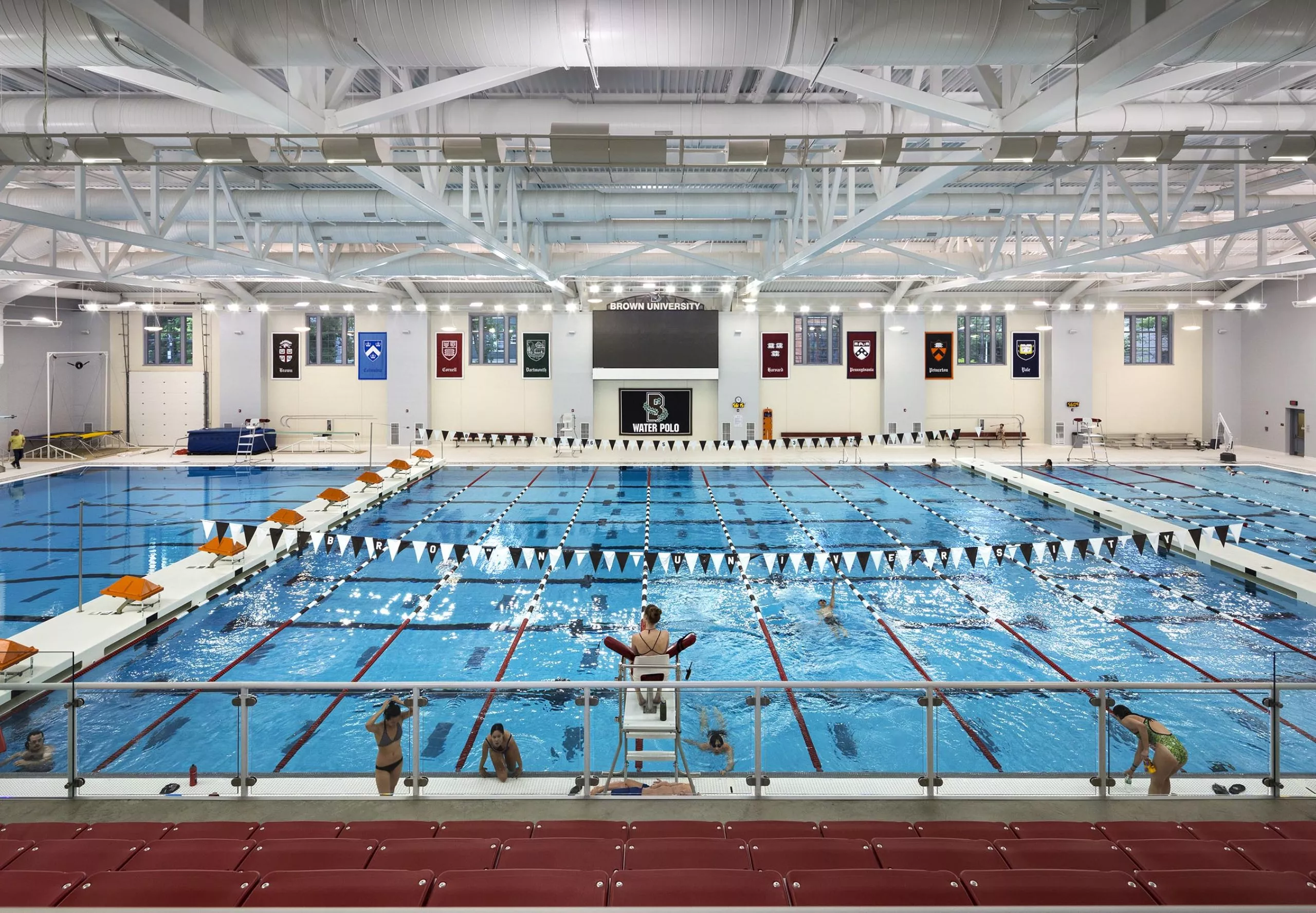 People swimming in pool inside Nelson Fitness & Coleman Aquatics Center