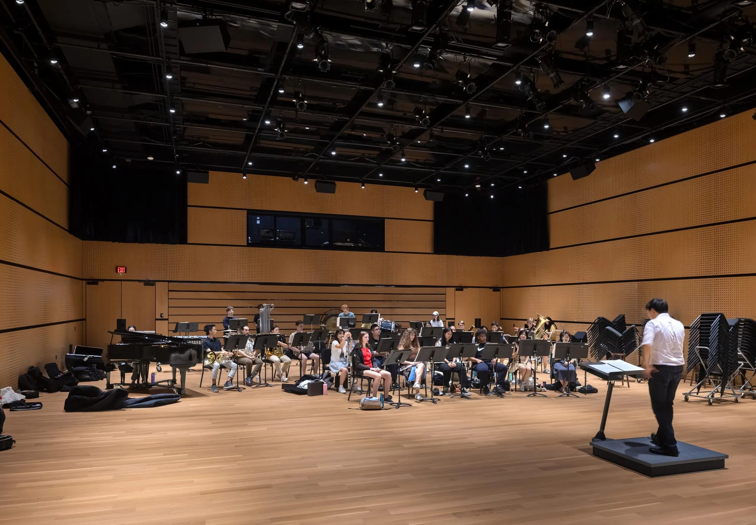 Orchestra practicing inside Lindemann Performing Arts Center