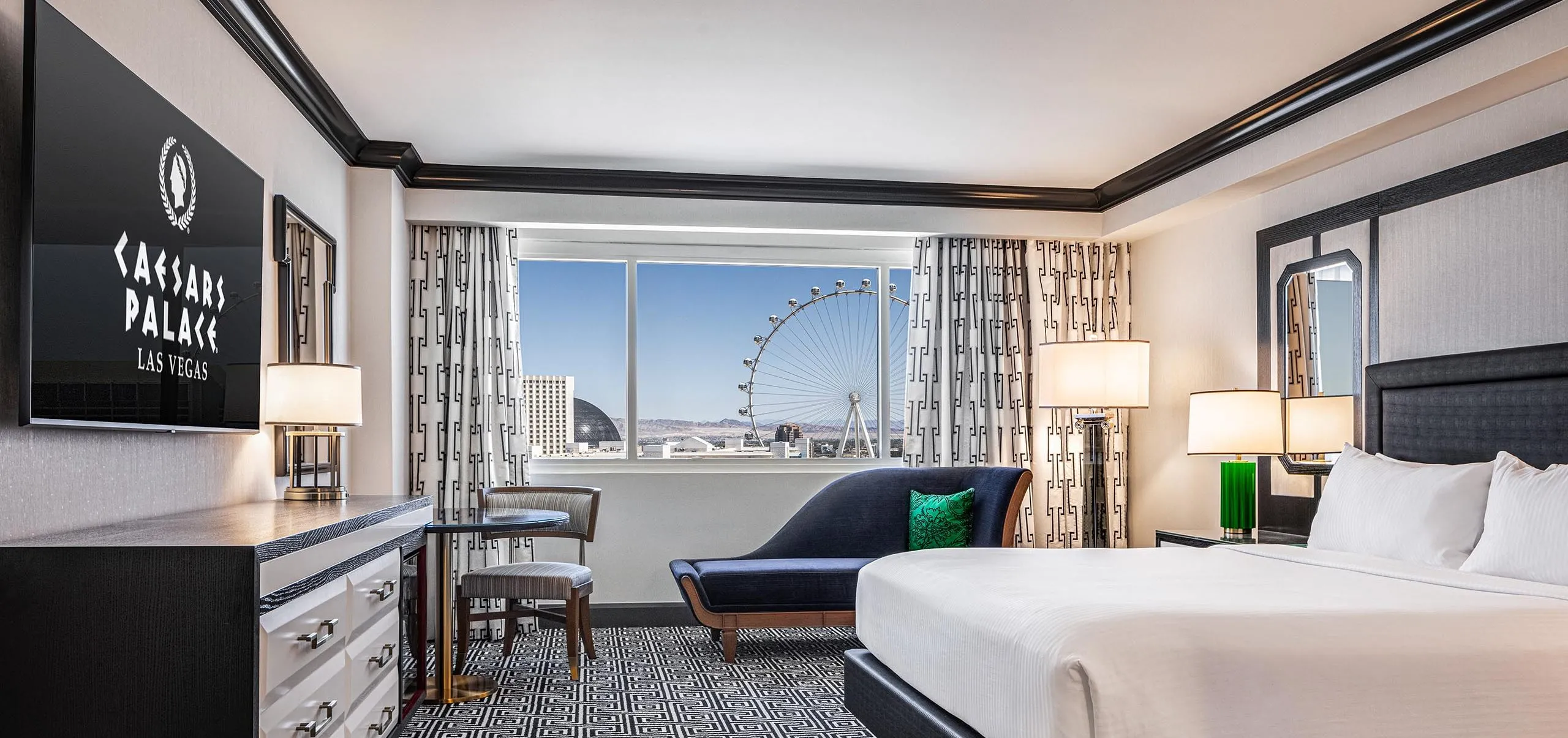 Interior view of hotel room with bed at Caesars Palace