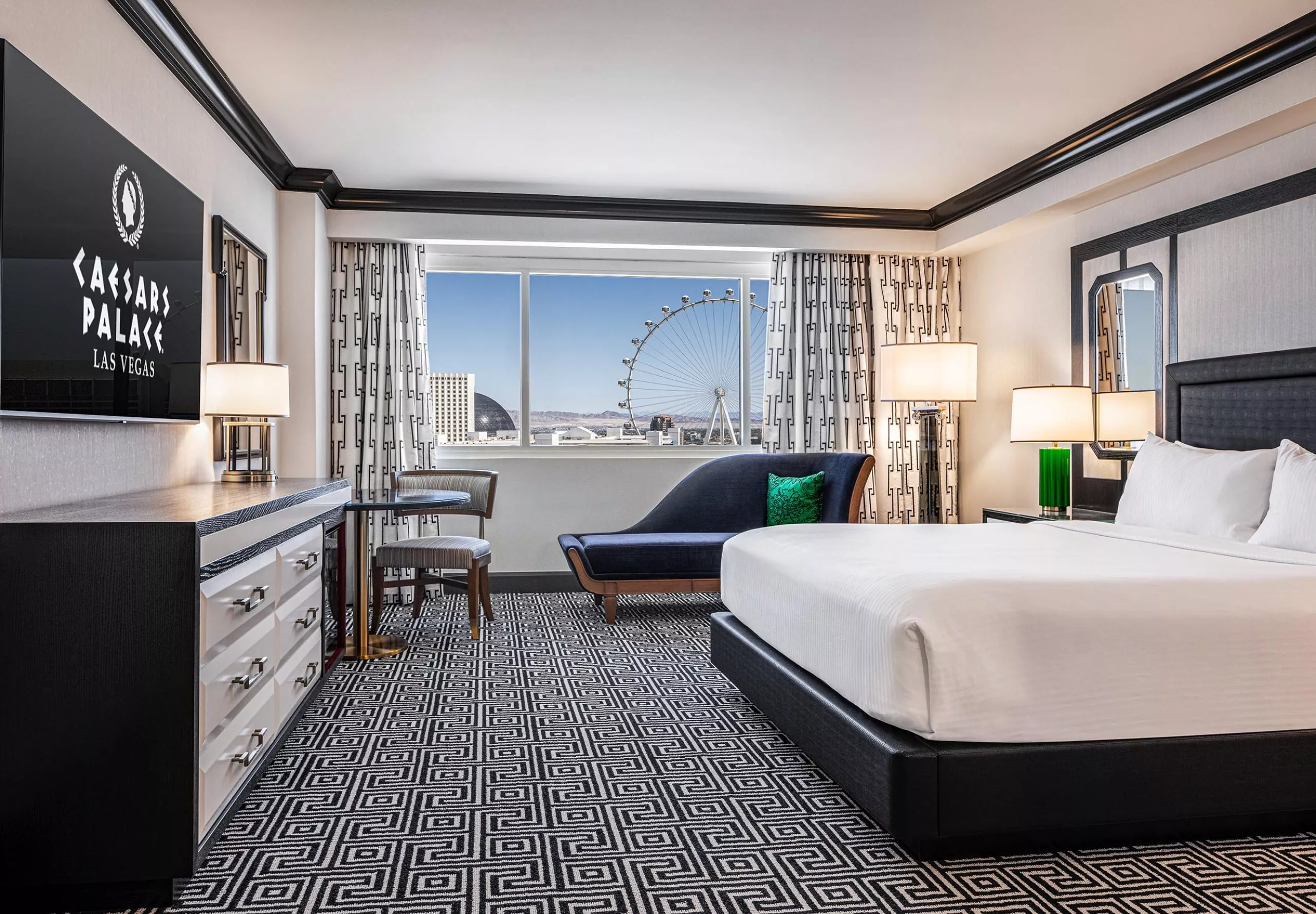 Interior view of hotel room with bed at Caesars Palace