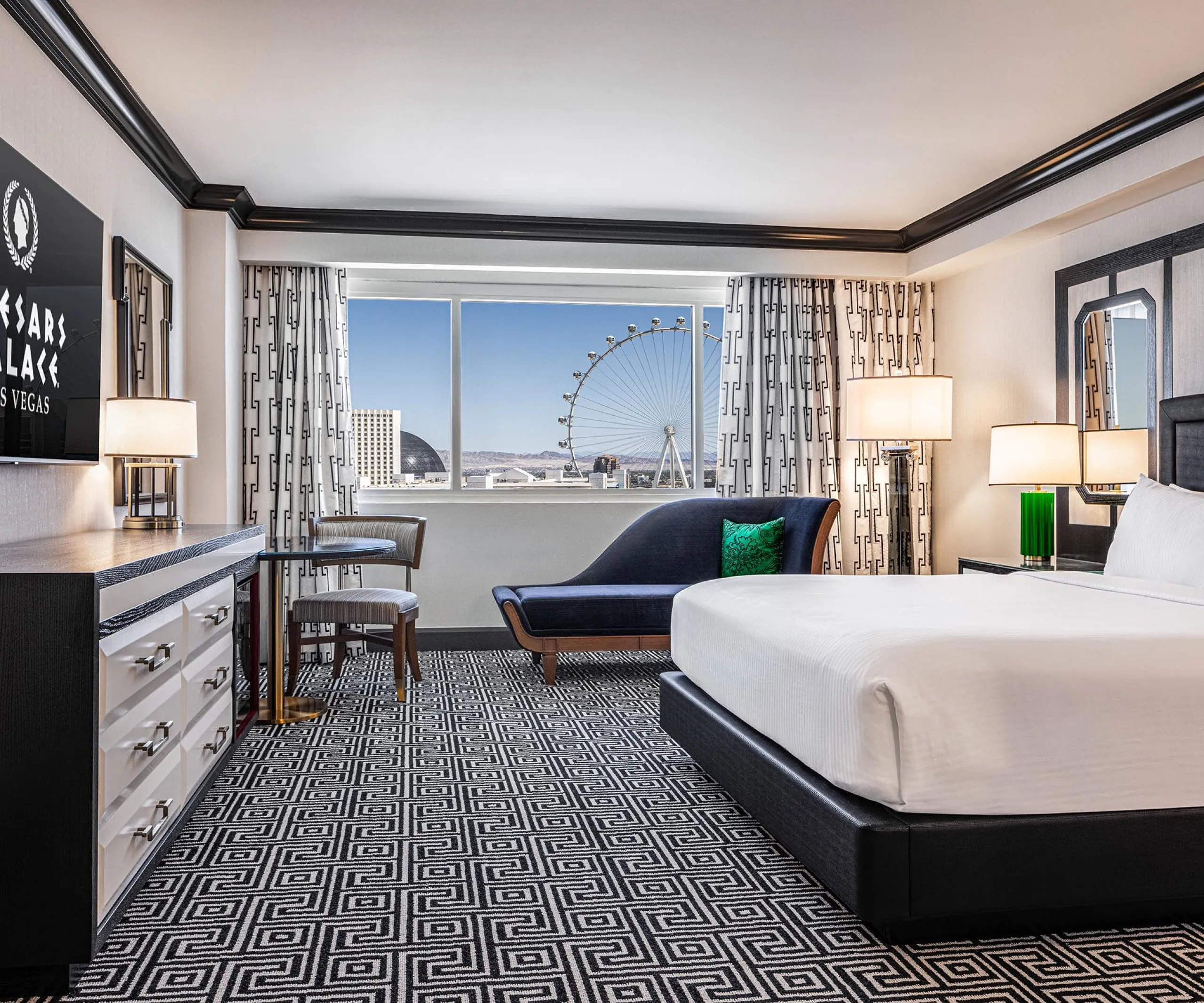 Interior view of hotel room with bed at Caesars Palace