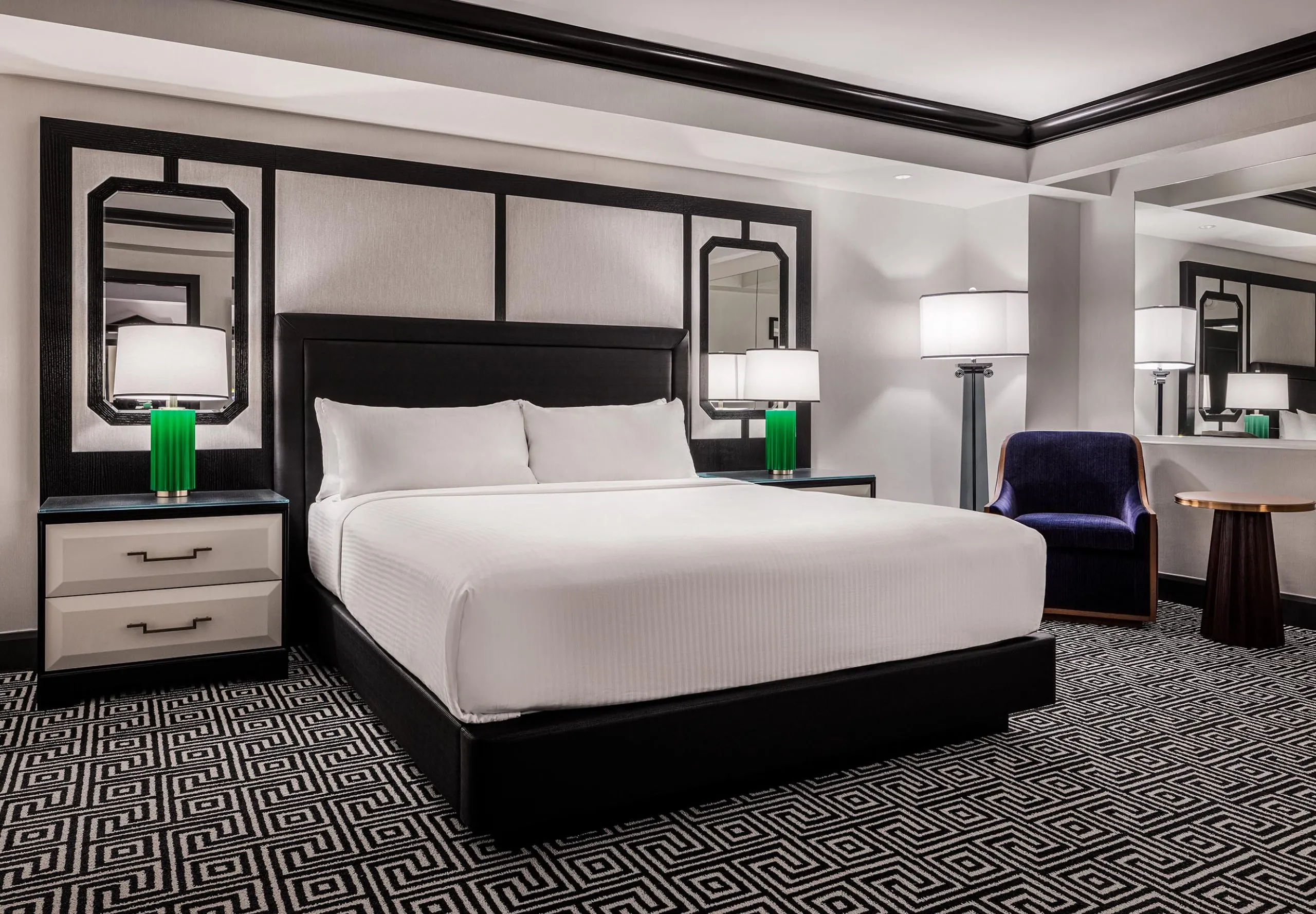 Interior view of hotel room with bed at Caesars Palace