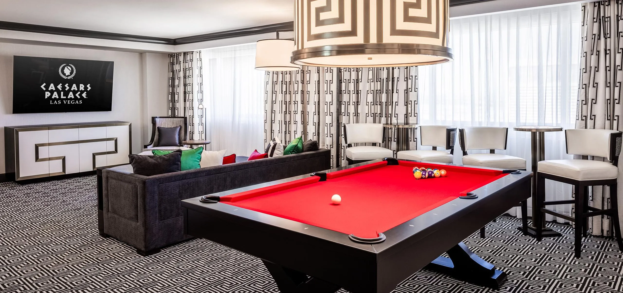 Interior view of hotel room with pool table at Caesars Palace