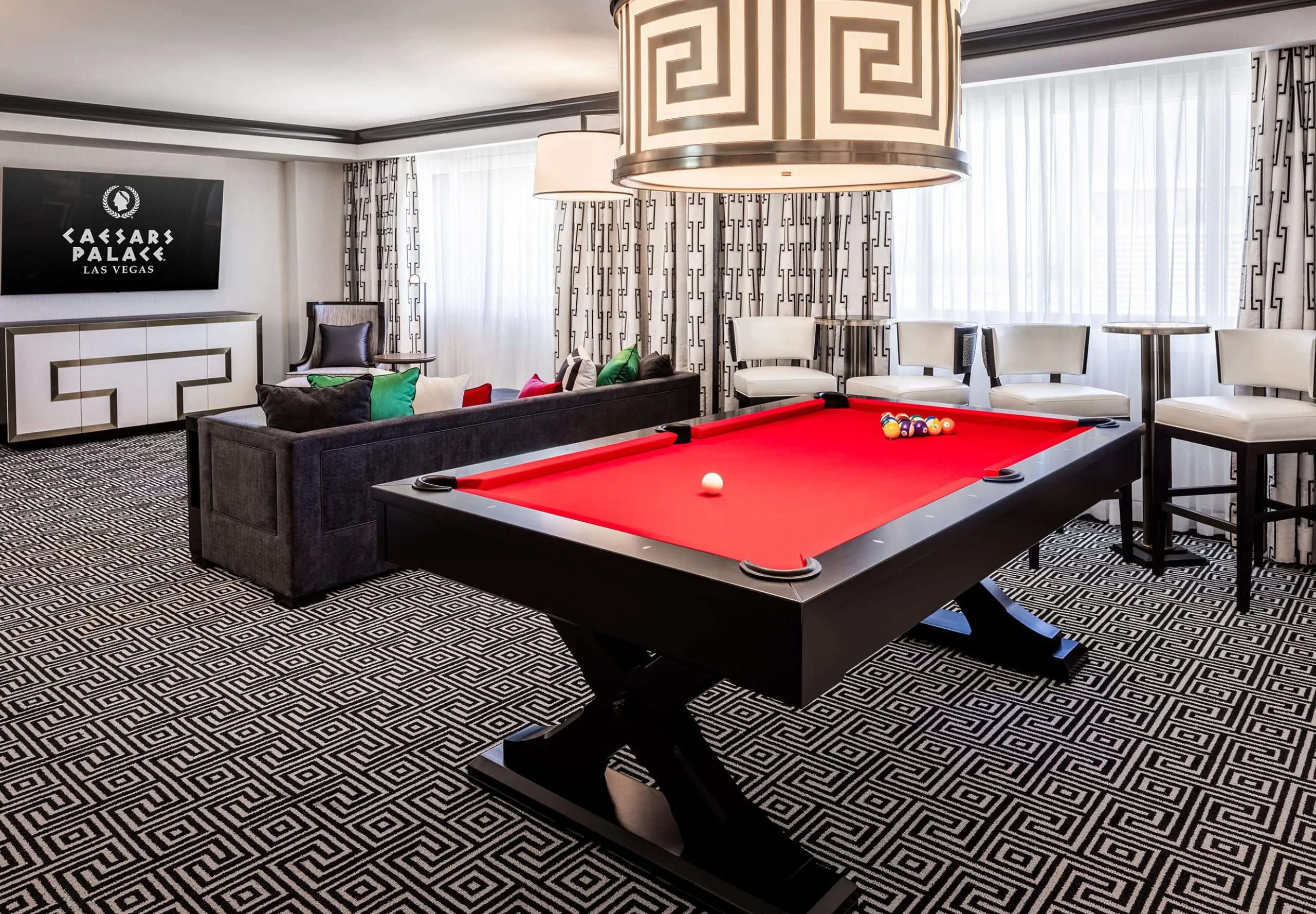 Interior view of hotel room with pool table at Caesars Palace