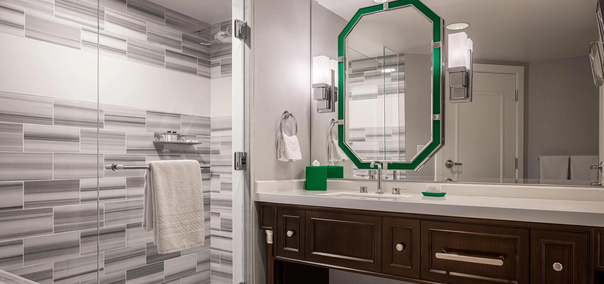 Interior view of hotel bathroom with shower and sink at Caesars Palace